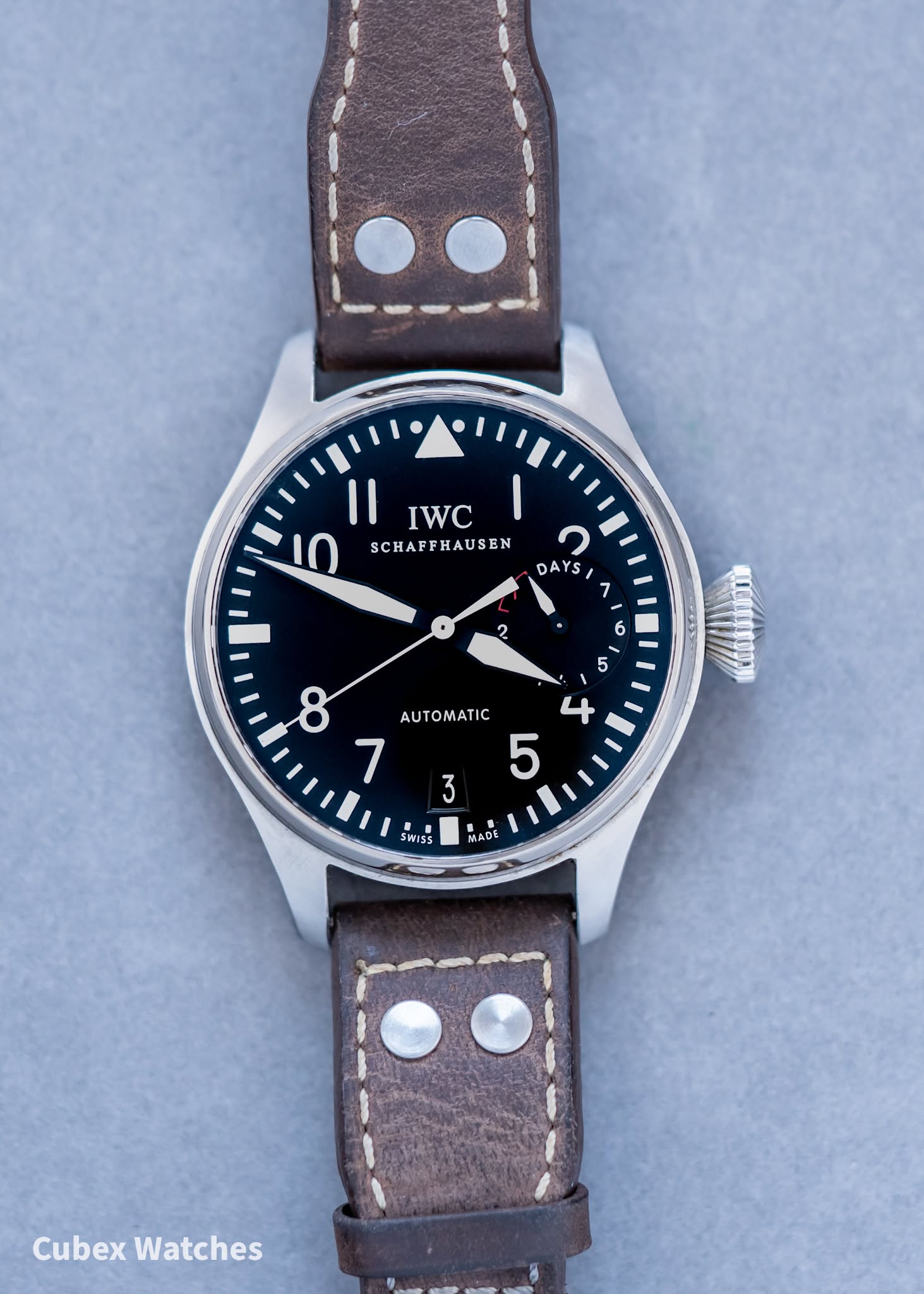 May be an image of wrist watch and text that says 'Il IWC I 10 SCHAFFHAUSEN 2 DAYS / 7 6 ഗ 8 AUTOMATIC 7 5 3 SWISS MADE Cubex Watches'