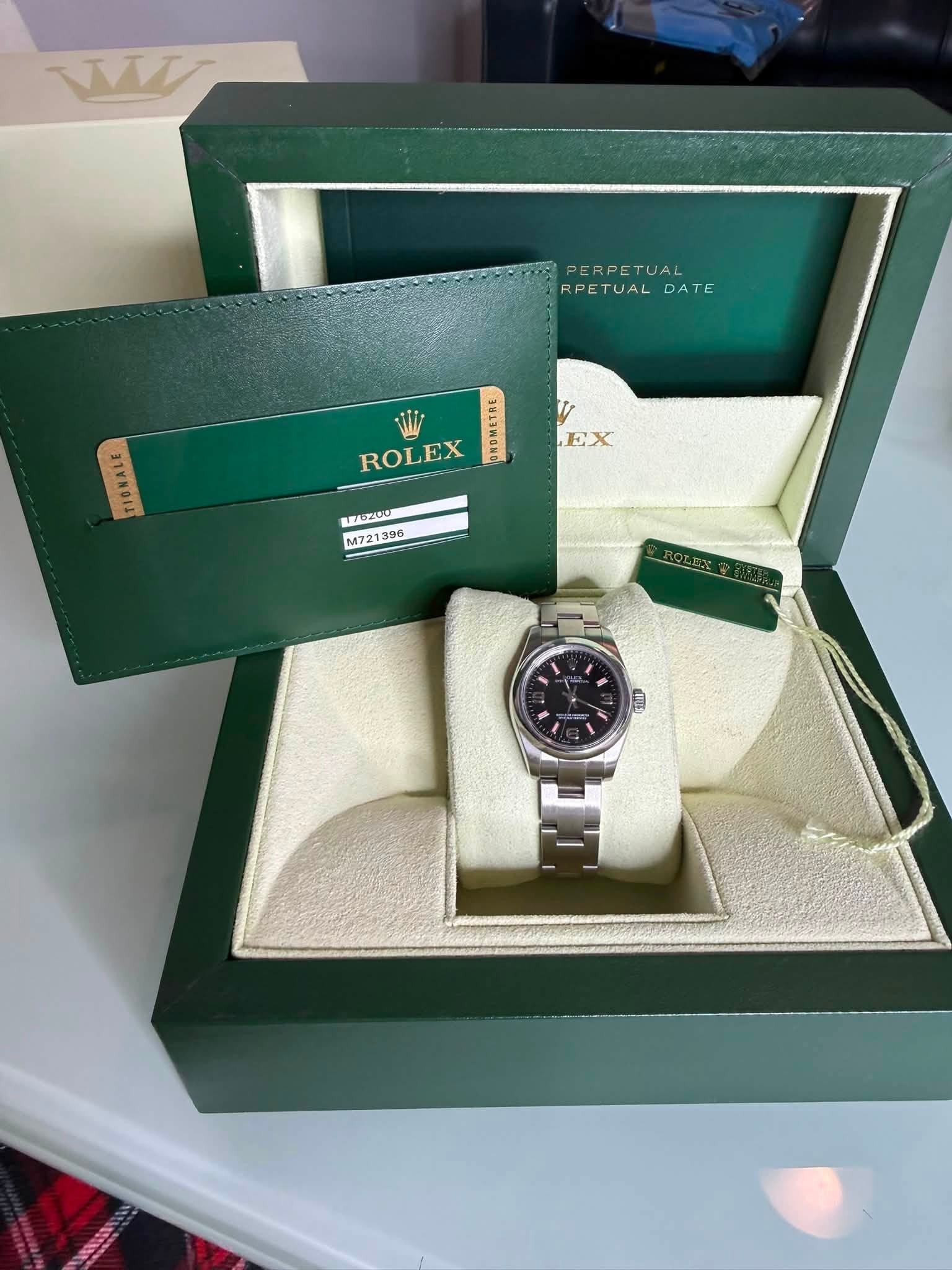 May be an image of wrist watch and text that says 'T PERPETUAL TUAL RPETUAL RPETUALDATE DATE Wi ROLEX 銈╕ EX LEADZ00 M72 M721396 396 STA'