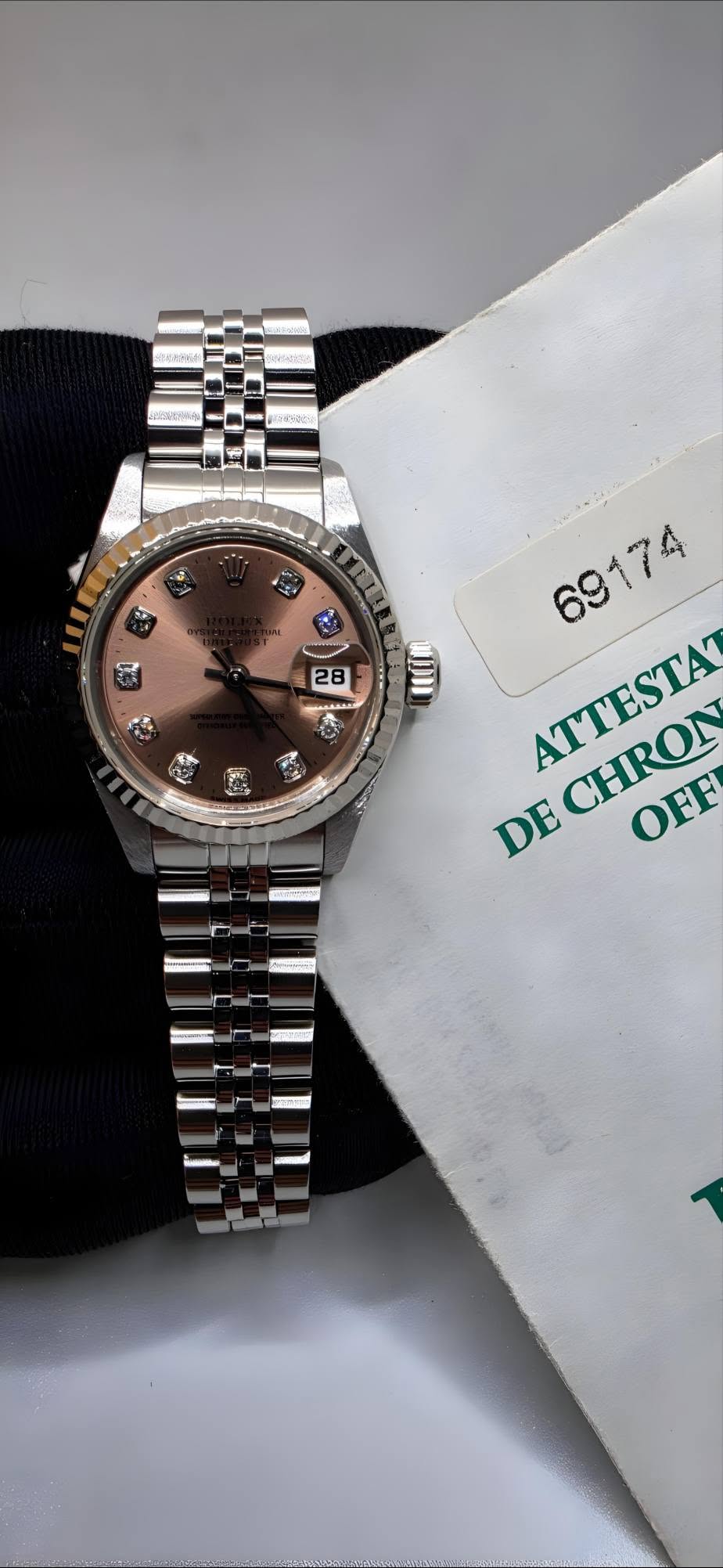 May be an image of wrist watch and text