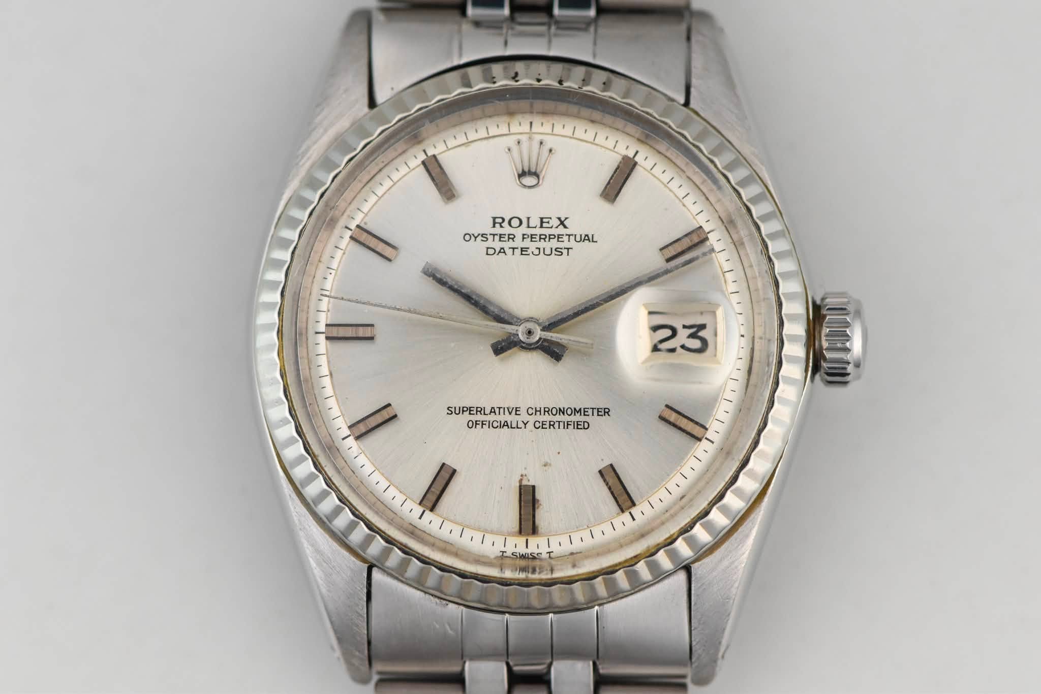 May be an image of wrist watch and text that says 'ROLEX OYSTER PERPETUAL TUAL DATEJUST 23 SUPERLATIVE SUPERLATIVECHRONOMETER CHRONOMETER OFFICIALLY OFFICIALLYCERTIFIED CERTIFIED…