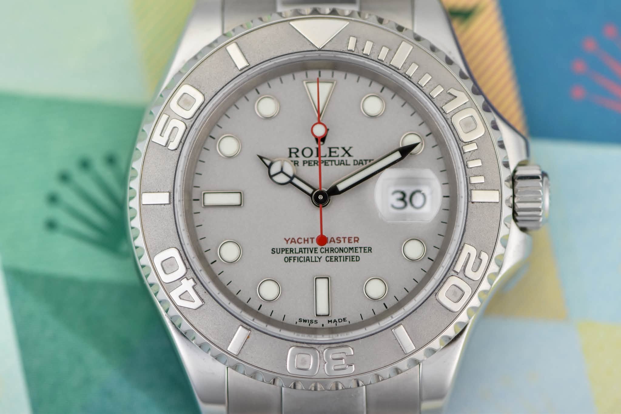 May be an image of wrist watch and text that says '50 ROLEX PERPETUALDAT "R PER PETUAL DAT 40 A 4 YACHT YACHTOASTER JASTER SUPERLATIVECHRONOMETER SUPERLATIVEC CHRONOMETER…