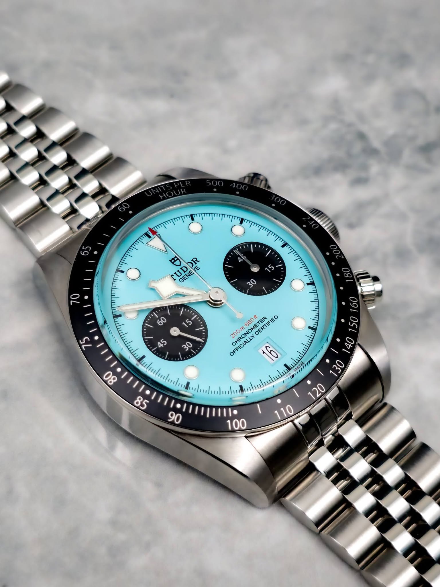 May be an image of wrist watch and text