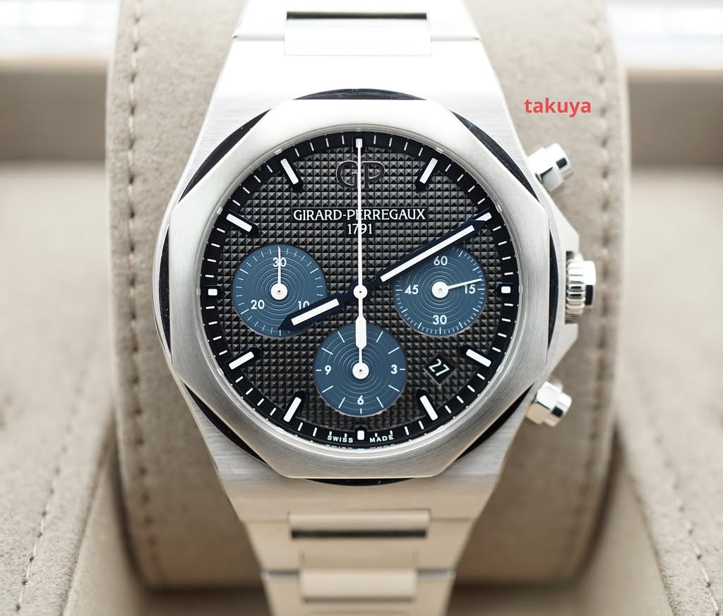 May be an image of wrist watch and text that says 'takuya GIRARD GIRARD-PERREGAUX P CRREGAUX m I รั้พเร์ง MADE'