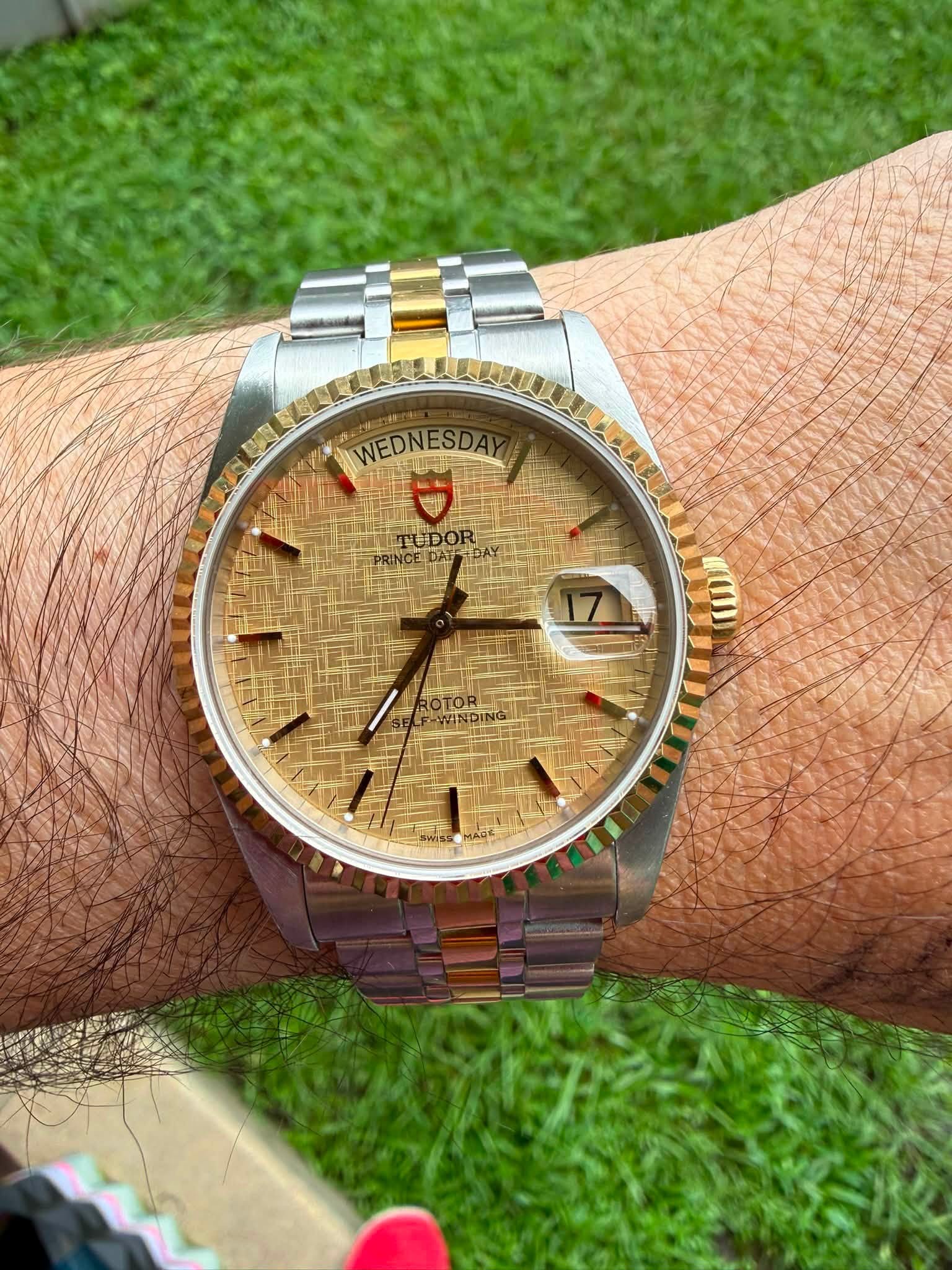 May be an image of wrist watch and text that says 'WEDNESDAY WEDNES NITEDOR'