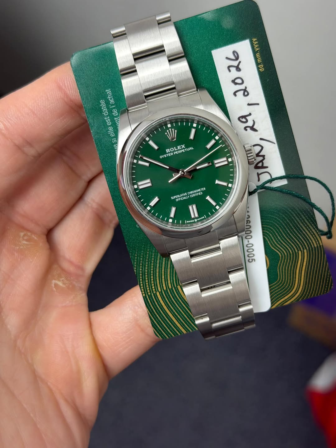 May be an image of wrist watch and text
