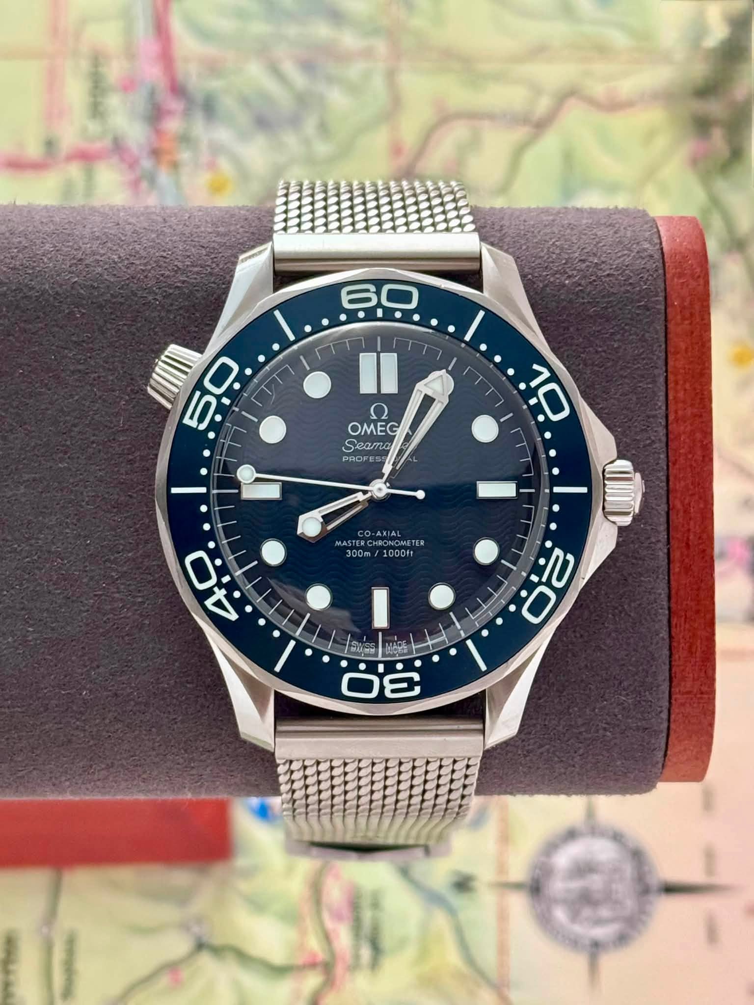 May be an image of wrist watch, map and text