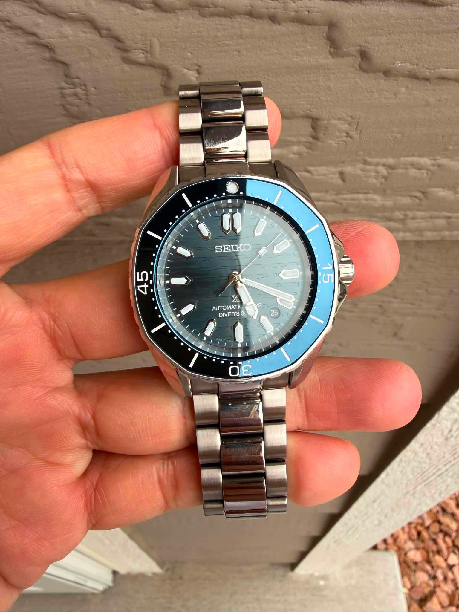 May be an image of wrist watch and text that says 'SEIKO SEIKO 45 O 5 1ን YS ምቤ AUTOMATI AUTOMATK DIVER'S I 25 25 Y 0 U 3 ١١'