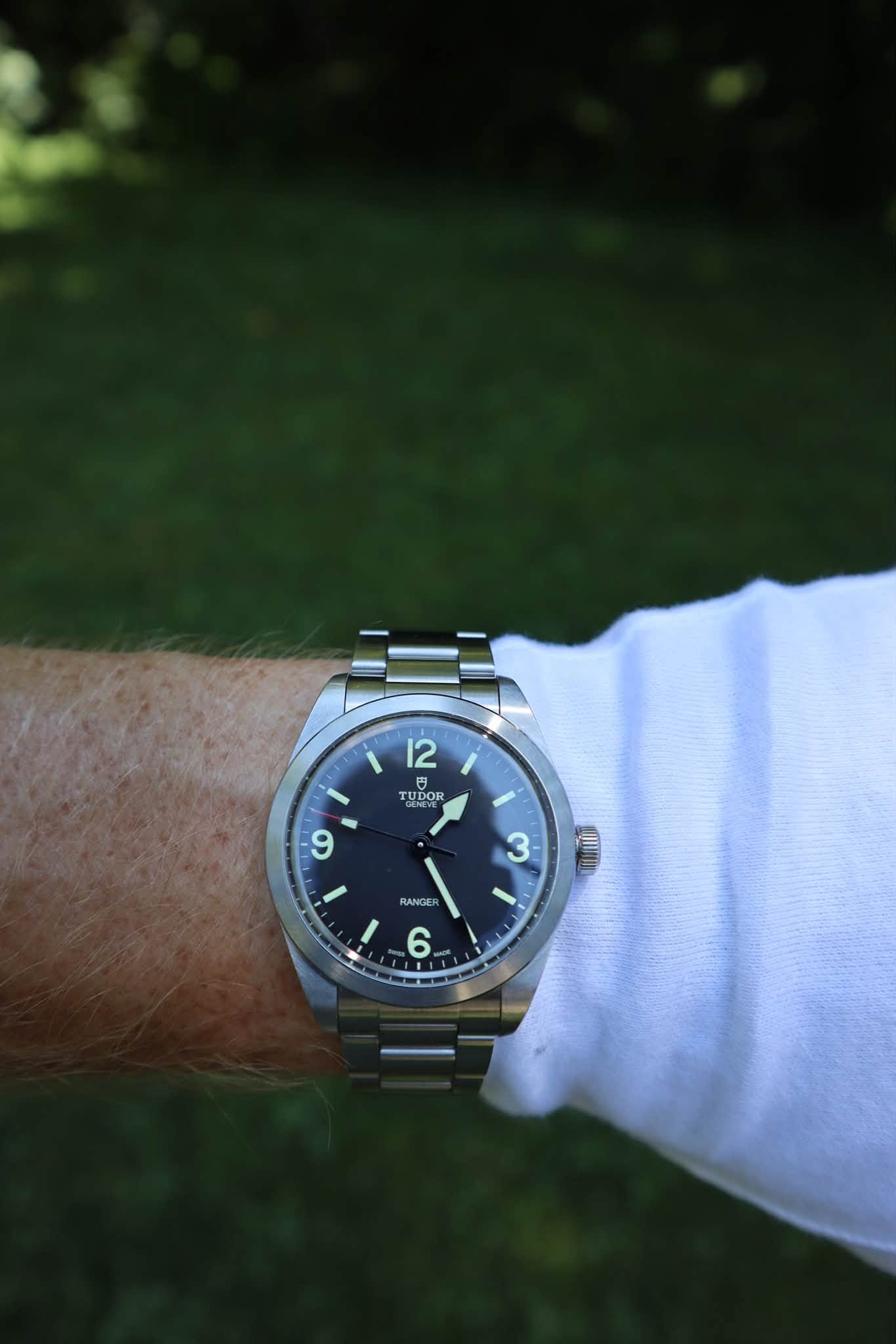 May be an image of wrist watch and text that says '12 TUDOR NOH UDOR و و 3 RANGER መ 6.'