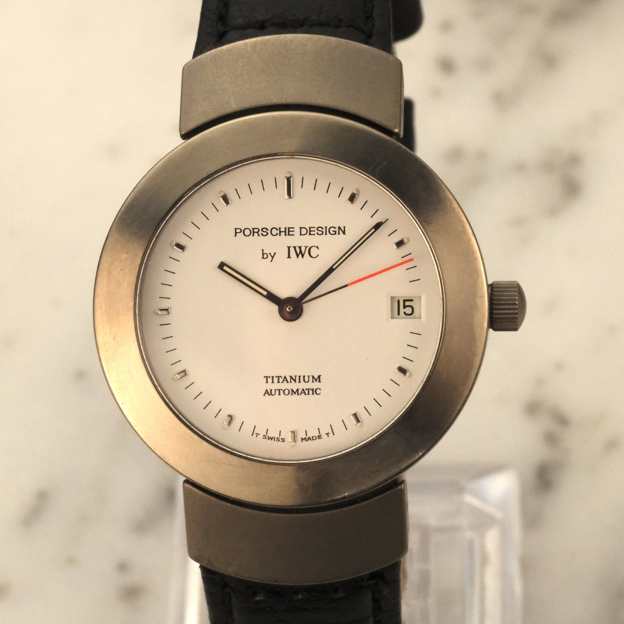May be an image of wrist watch and text
