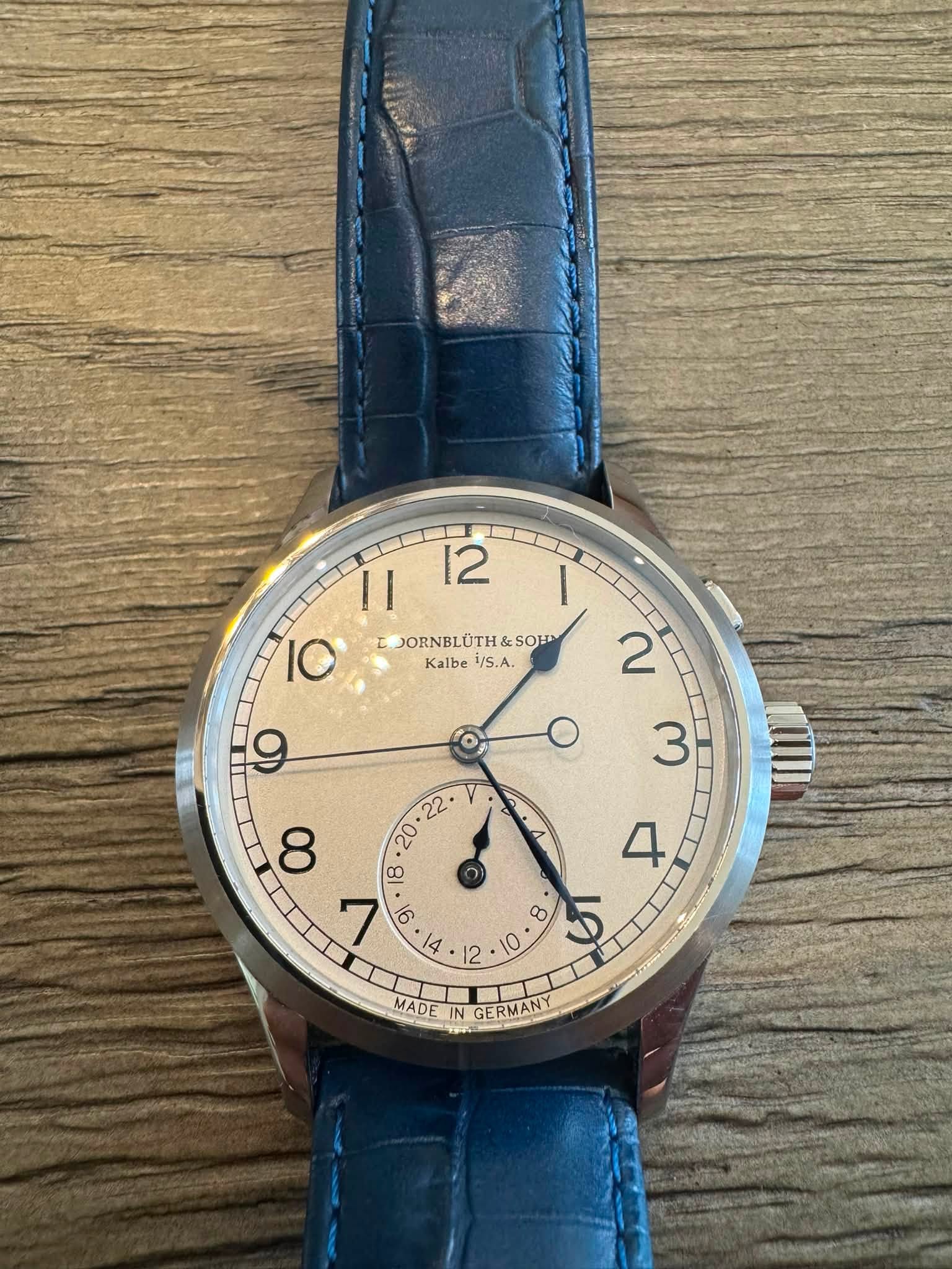 May be an image of wrist watch and text that says '11 12 ١ 10 JORNBLU JORNBLÜTH&SO! Kalbe /S.A. A V 9| ه 8 لا か ν د O 2 ADE MADE MAD IN GERMAN'