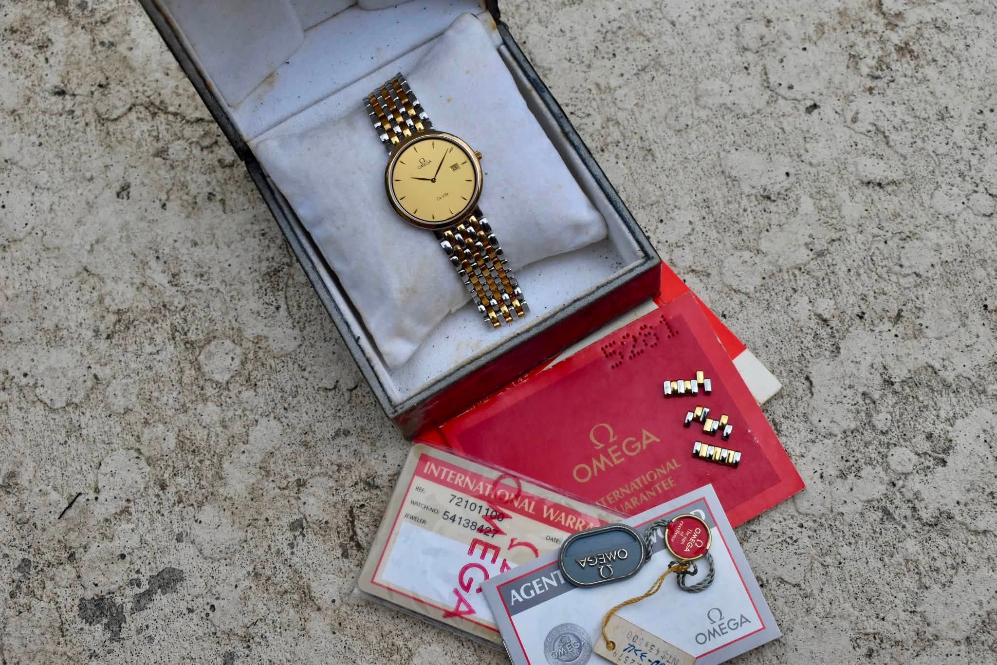 May be an image of digital watch and text that says 'ا و דריי 5281 በሜነ አዳተ INTERNAT.ONA INTERNAT OMEGA KWtLsR IICHNO - OWAL AL WARR Γπ มิบย AOIWO 4E () AGENT OMEGA OMEGA 2'