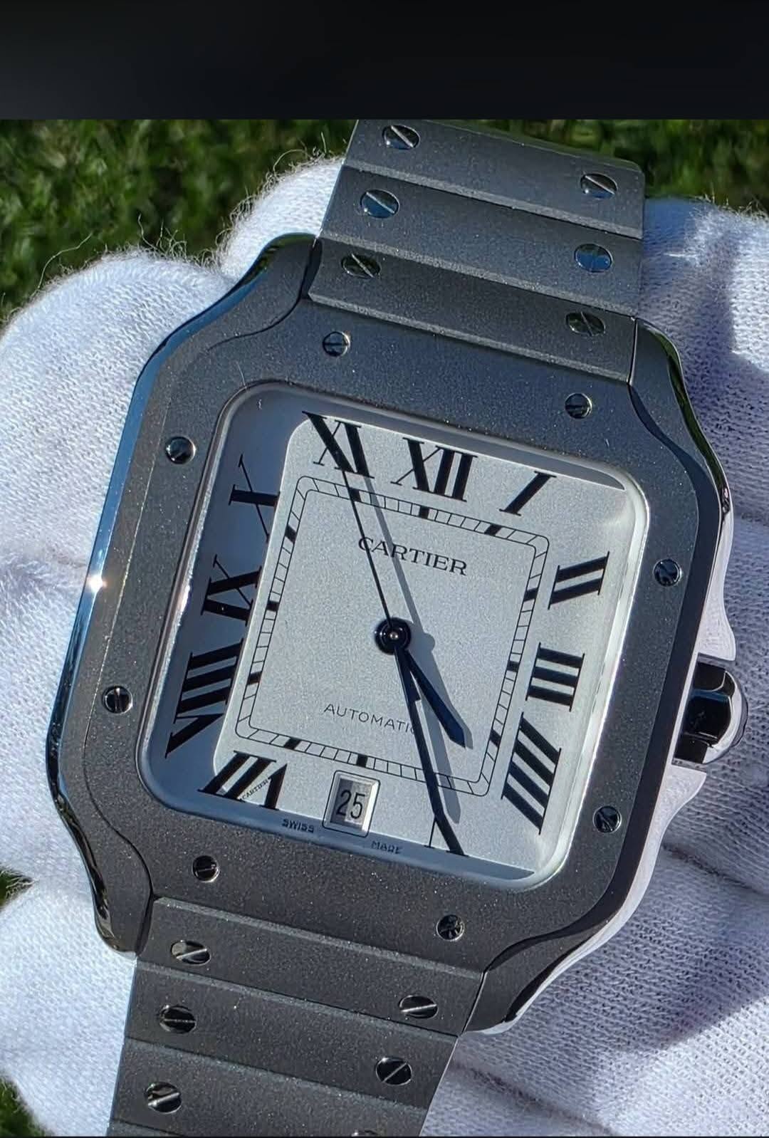 May be an image of wrist watch and text that says 'TN XIII KA RTIER RTIER LLLI AUTOMATI AUTON MATI II م W י1 SWD ょま吧'