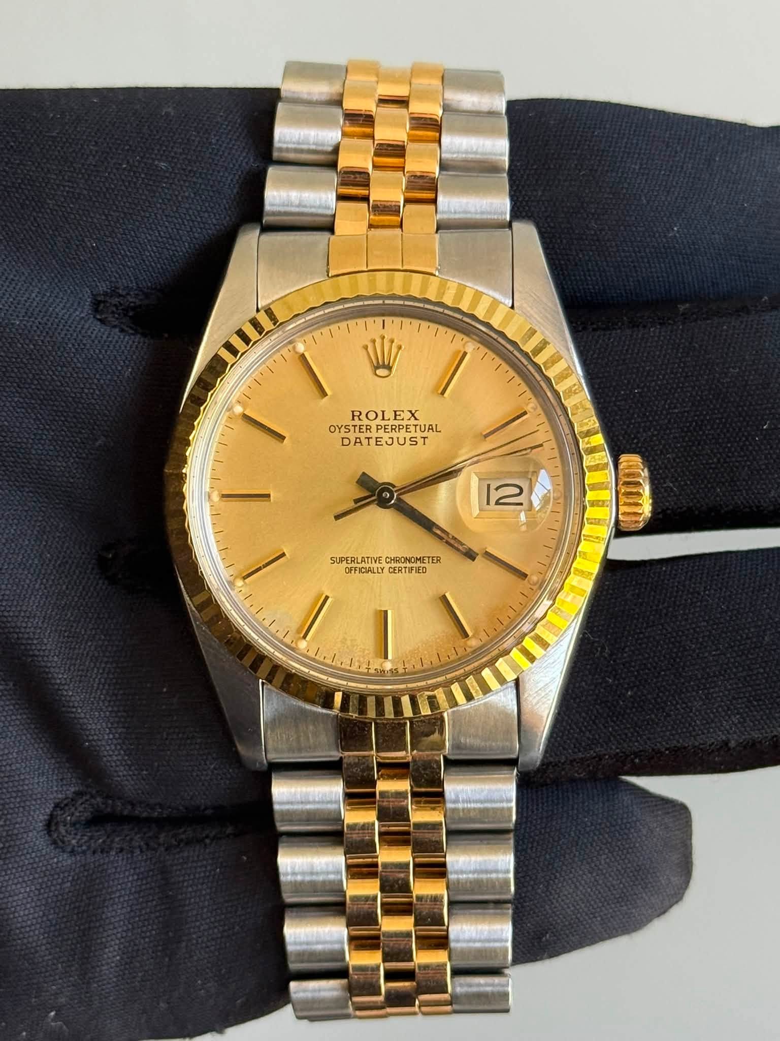 May be an image of wrist watch and text that says 'ROLEX OYSTERP TERERPETUAL PERPETUAL DATEJUST 12 SUPERLATIVE SUPERLATIVEOHONOHETER CHRONOMIETER OFFICIALLY CERTIFIED O'