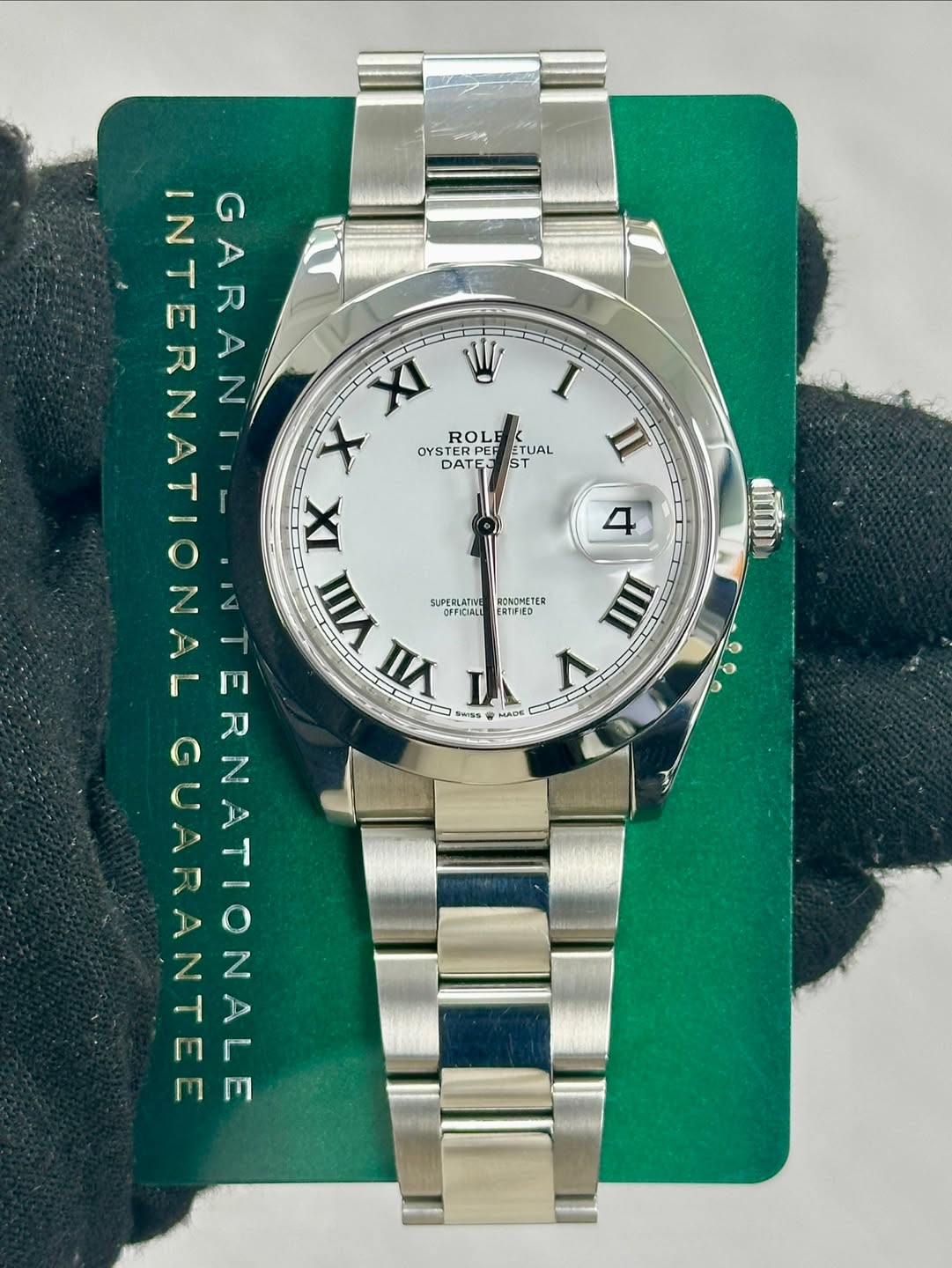 May be an image of wrist watch and text that says 'II 4 SUPERLATIVE GARAN XI W X ROLE OYSTER TERPE ERPER ETUAL OYS DATE DATE IX 含 VII ل VII MADE IIII ERNATIONALE ERNATIO <…