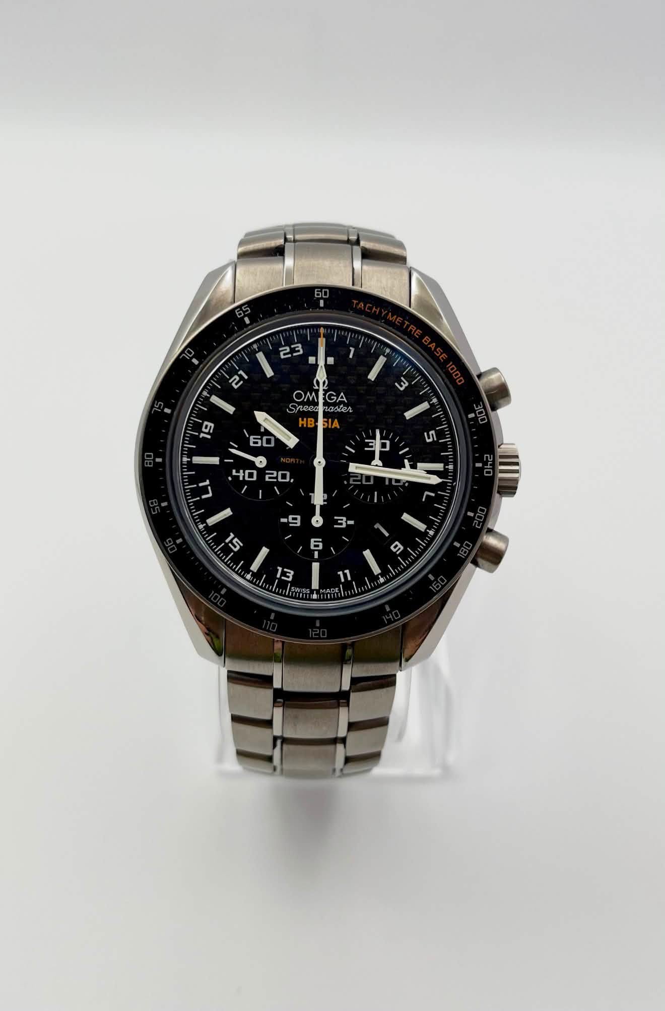 May be an image of wrist watch and text that says ' I 3 12 OMEGA GP A OM GA GA eacad 15 60 و '