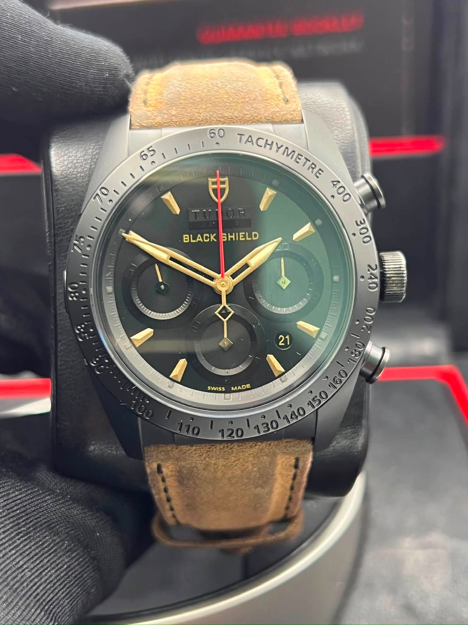 May be an image of wrist watch and text