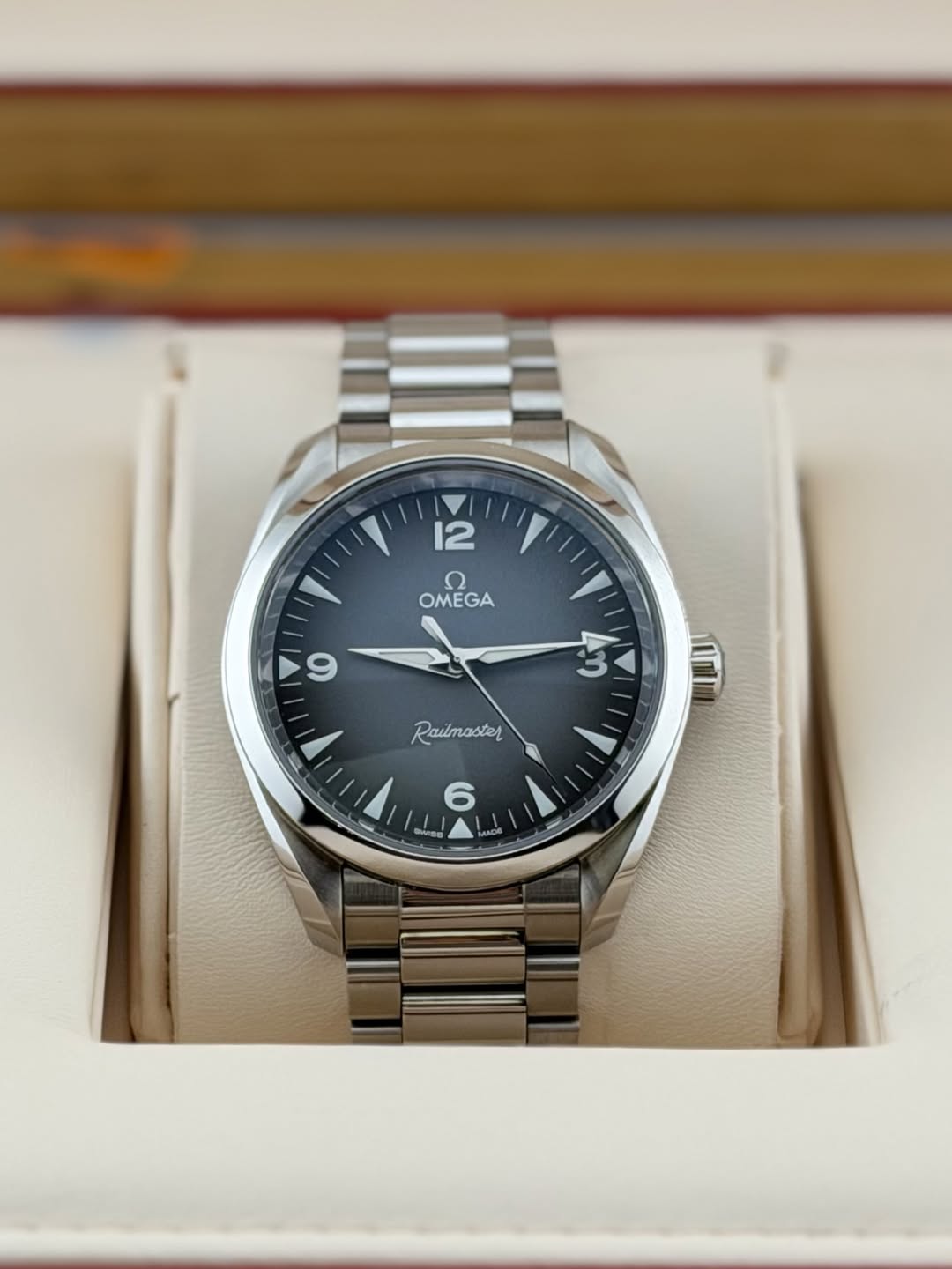 May be an image of wrist watch and text that says '12 OMEGA OMEGA 9 43 Railmaster นบ'