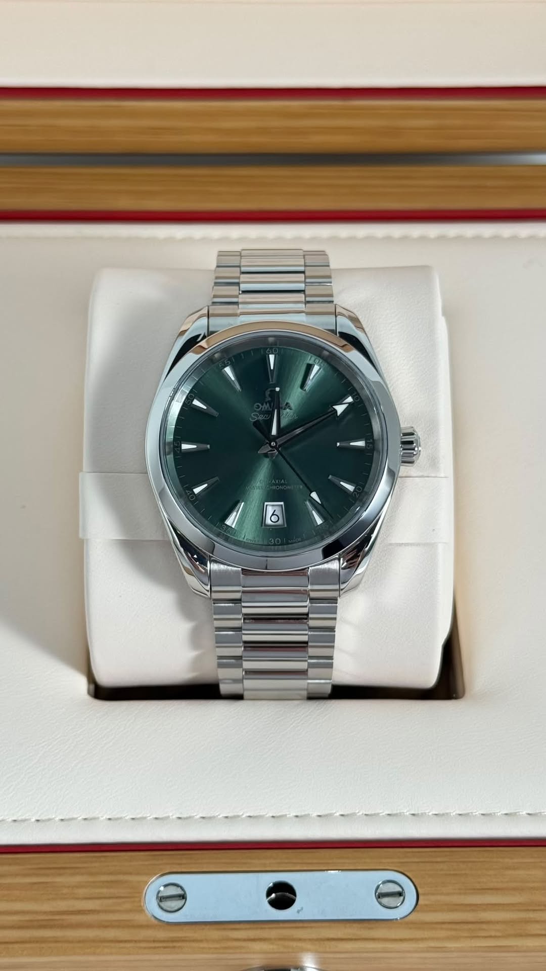May be an image of wrist watch and text