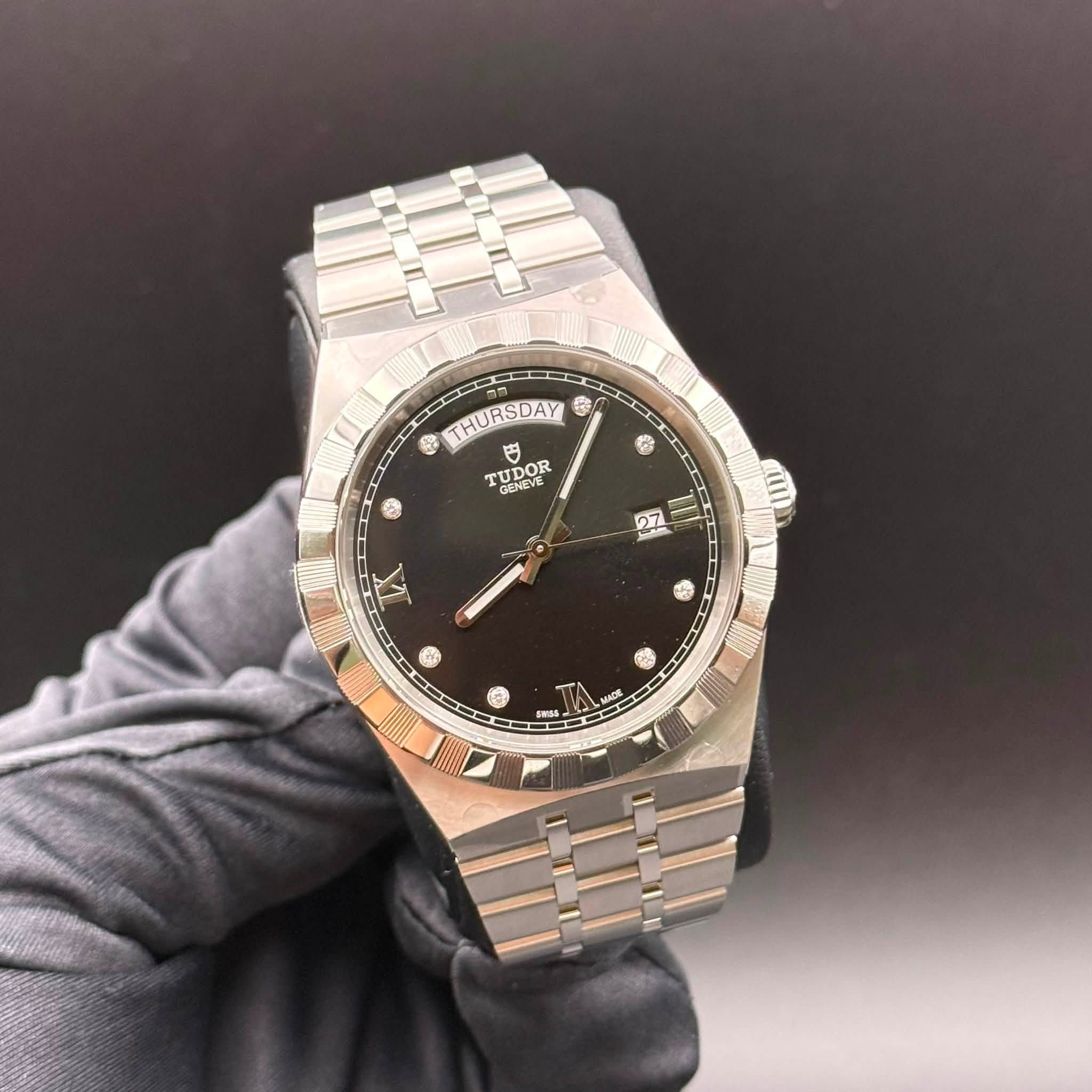 May be an image of wrist watch and text that says '☬ी THURSDAY ហ TUDOR CENSUO GENEVE G 0 27 l # + 60 SW55- MAGE'