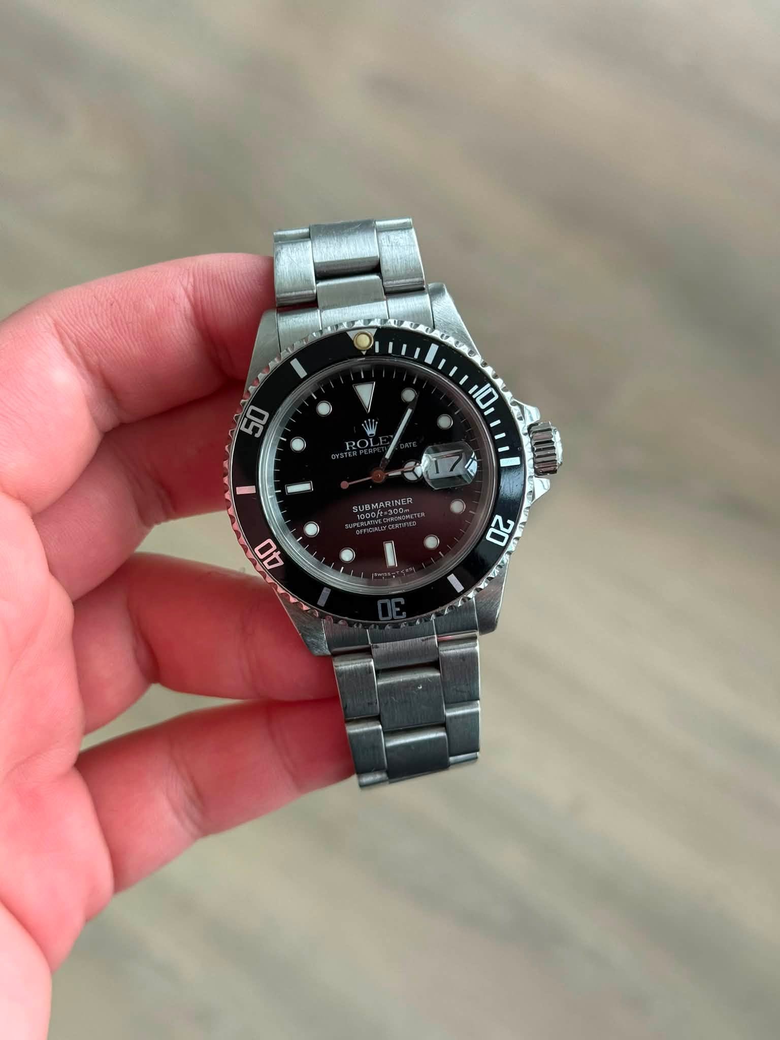 May be an image of wrist watch and text that says '50 10 A0 گ ANT'