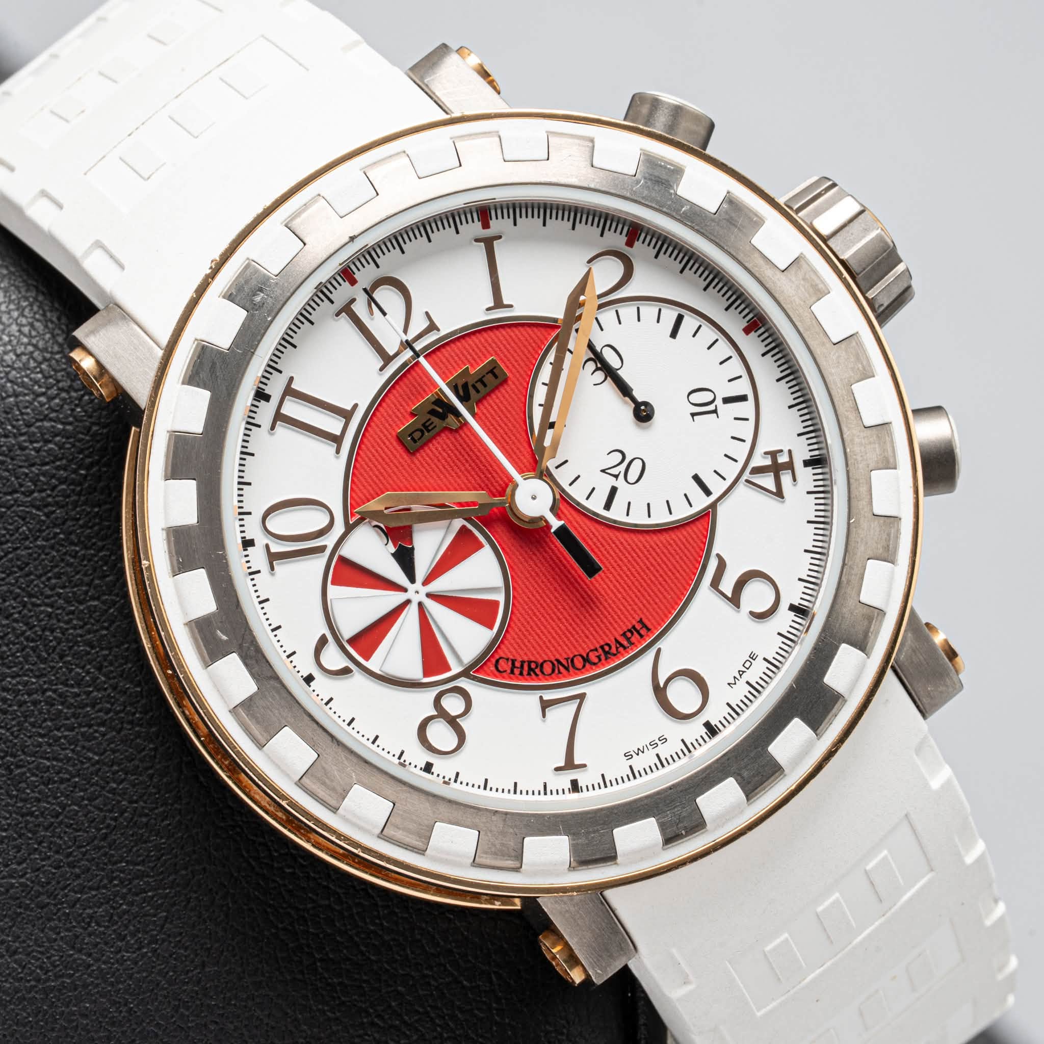 May be an image of wrist watch and text