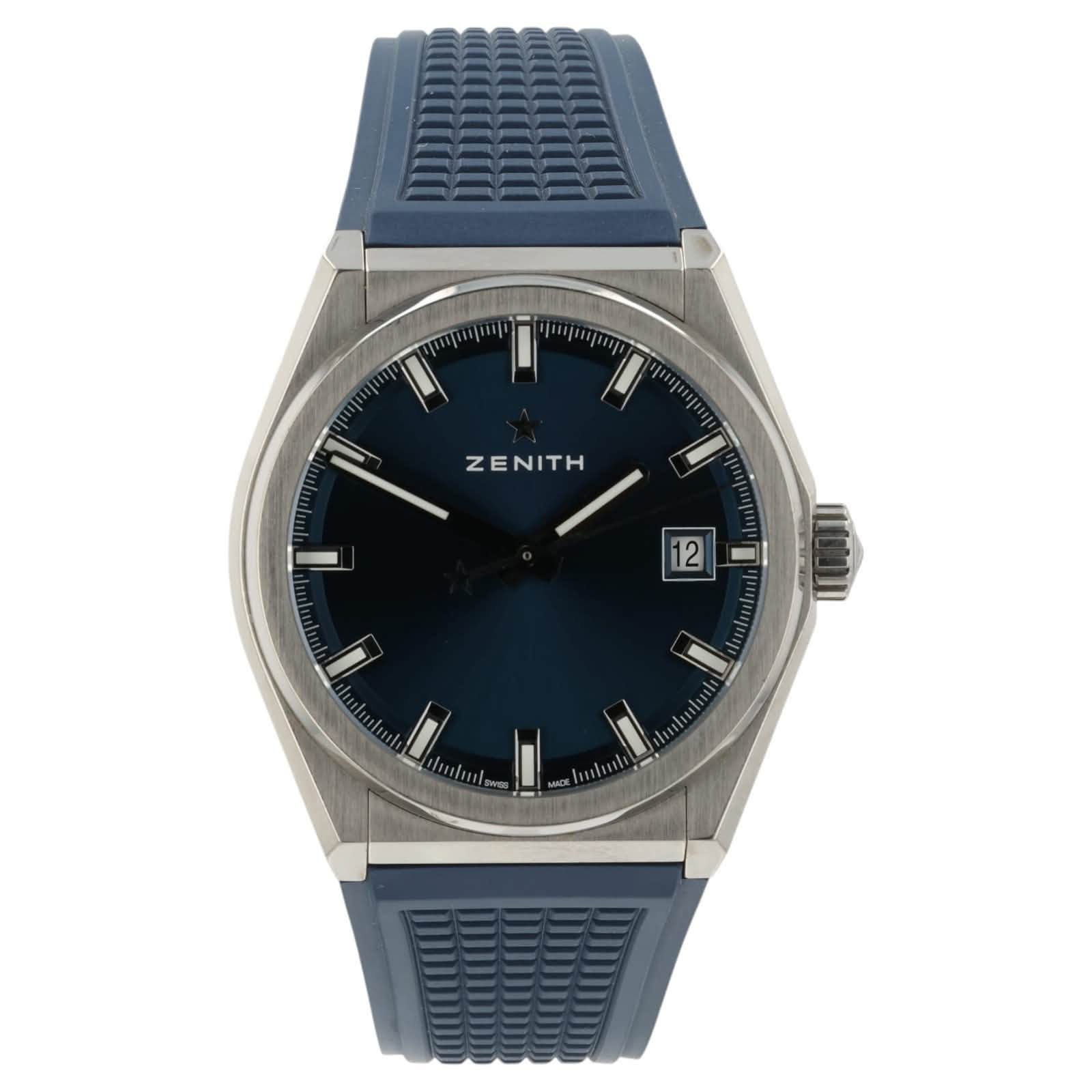 May be an image of wrist watch and text that says '- 一 ZENITH 12 mlu'