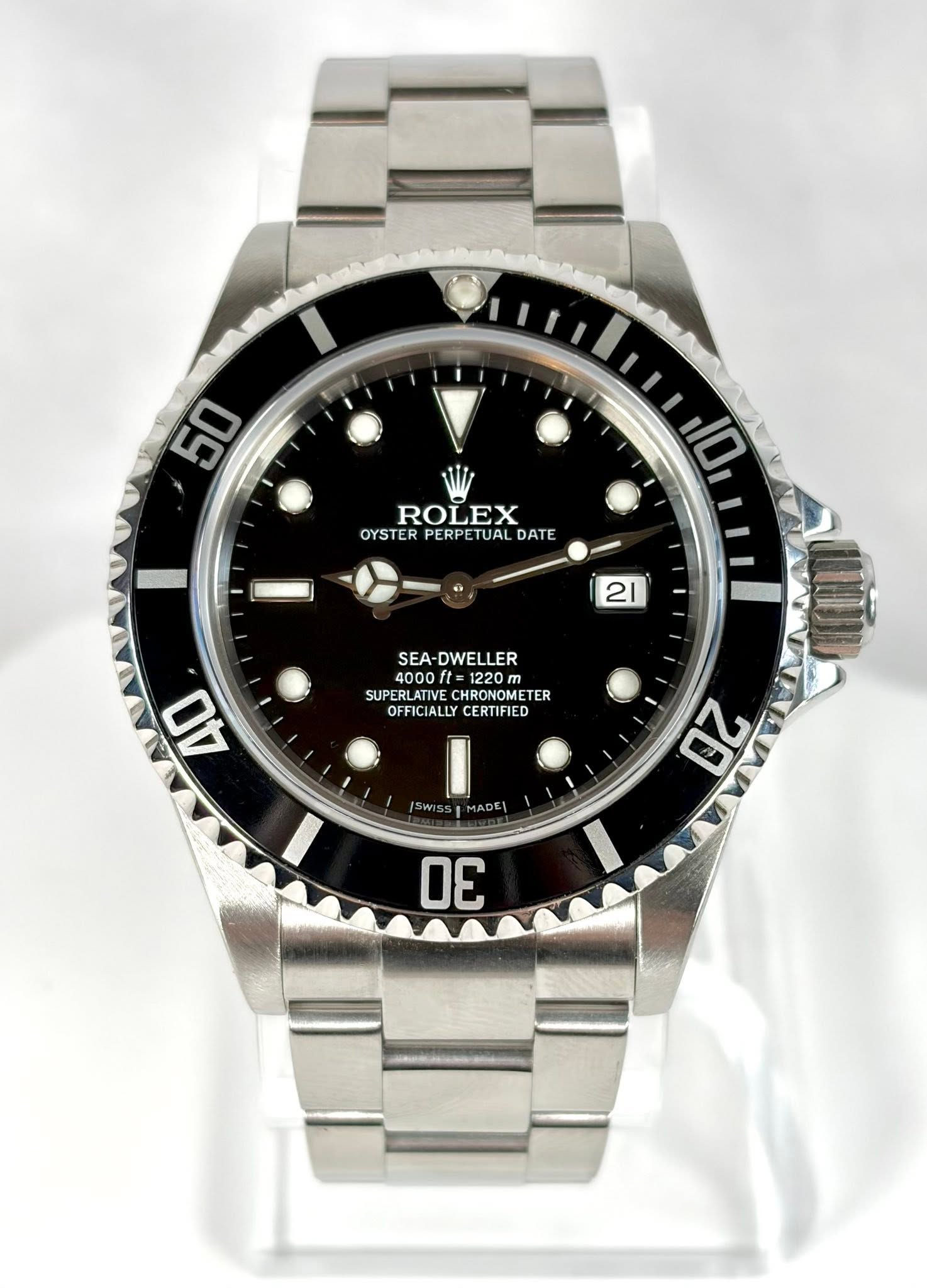 May be an image of wrist watch and text that says '50 ROLEX OYSTER PERPETUAL OYSTERPERPETUALDATE DATE 10 21 SEA- DWELLER 4000 ይ0 SUPERLATIVE CHRONOMETE SUPERLATIVECHRONOMETER TER…
