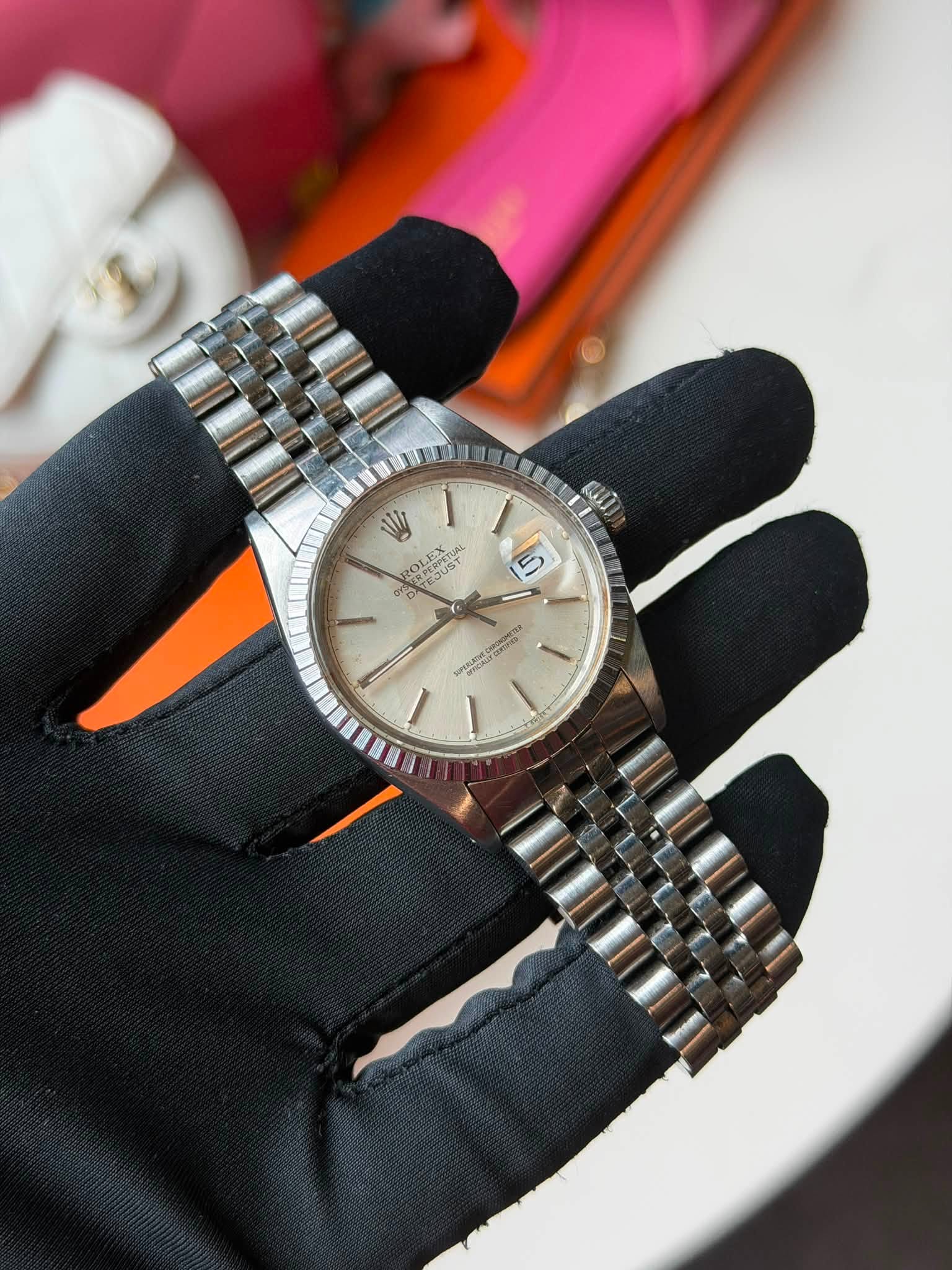 May be an image of wrist watch and text