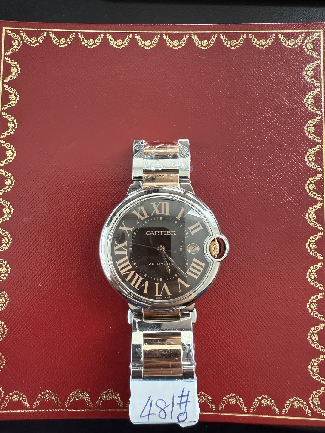 May be an image of wrist watch and text that says 'XIXII XII XI X CARTIER X بر VIIVII VI V لى ባ III 48#A 4814'