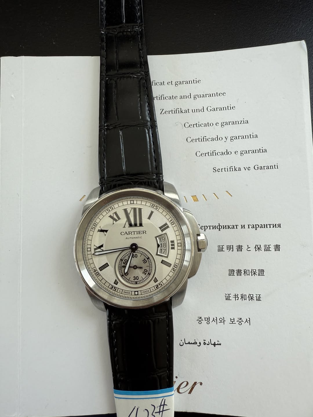 May be an image of wrist watch and text that says 'ficat el ficatelgarantie 몸ra치 garantie rlificate and guarantec Zertifikat. und Garantie Cerlicato garanzia Cerlificadoy…