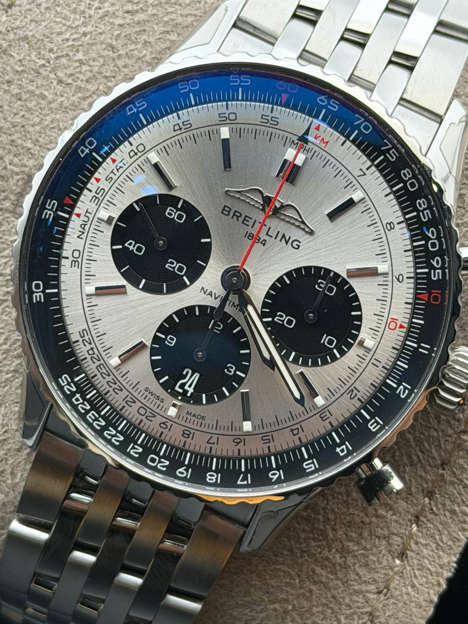 May be an image of wrist watch and text that says ' lit 40 AT. ויוייין 35 35 आारधरड 50 55 भिणगणाय 65 ψιιppm KM و BREITLING LING BREI 8 30 20, NAV SWISe SWISS 24 1 လ iiuiluite 81…