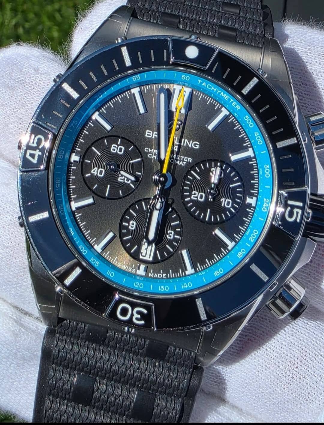 May be an image of wrist watch and text