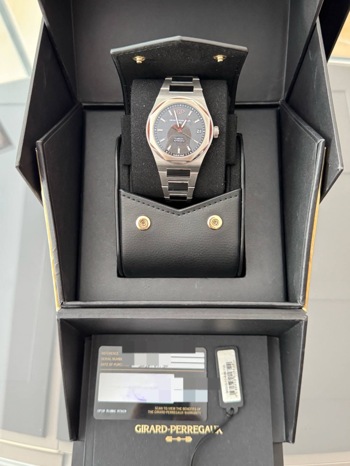 May be an image of wrist watch and text