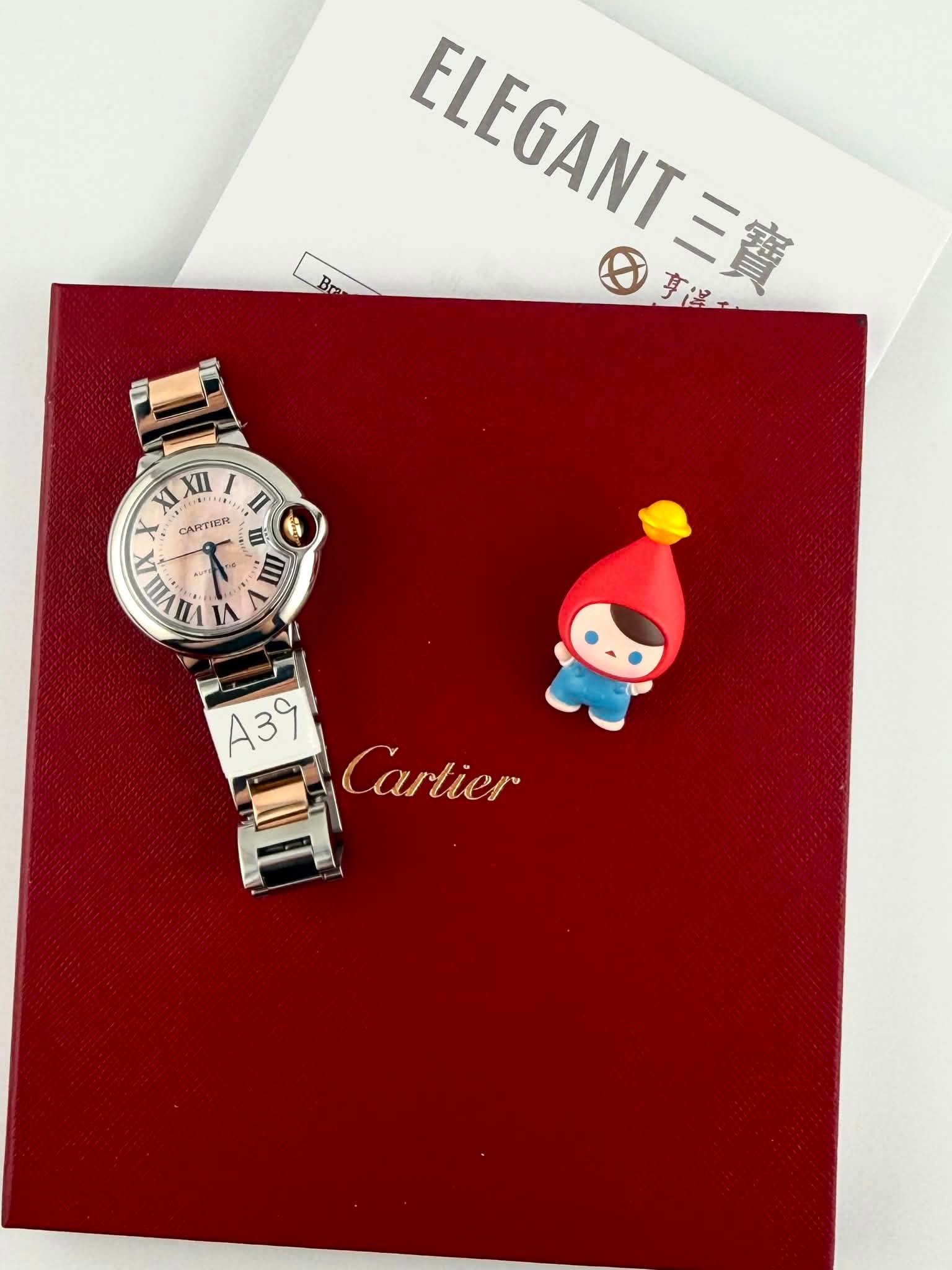 May be an image of wrist watch and text that says 'ELEGANT FLEGANT Br 日禮一 享. 三寶 XL XII I CARTIER A VIII A ١٨ A3R ECartier Cartier'