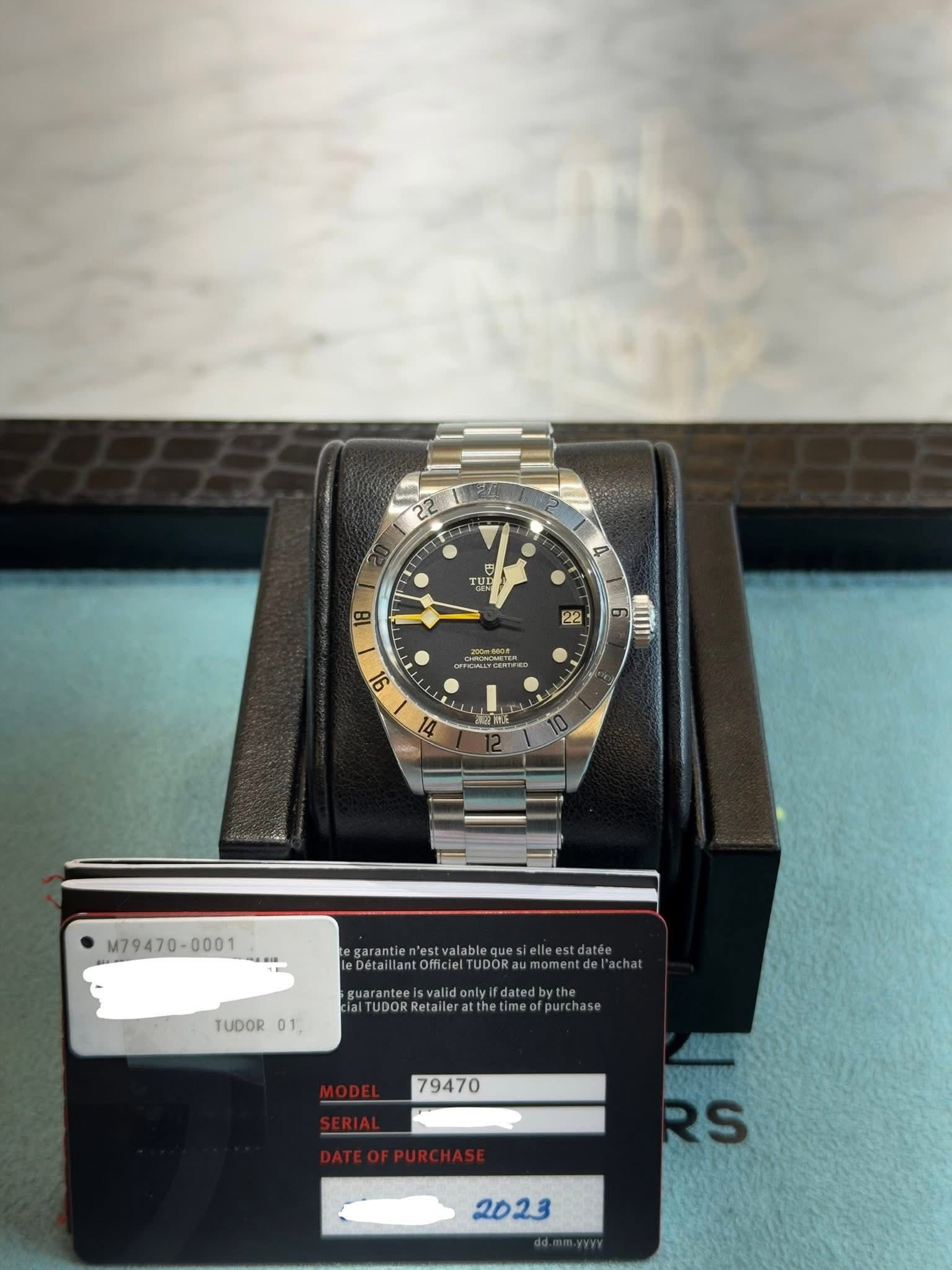 May be an image of wrist watch and text