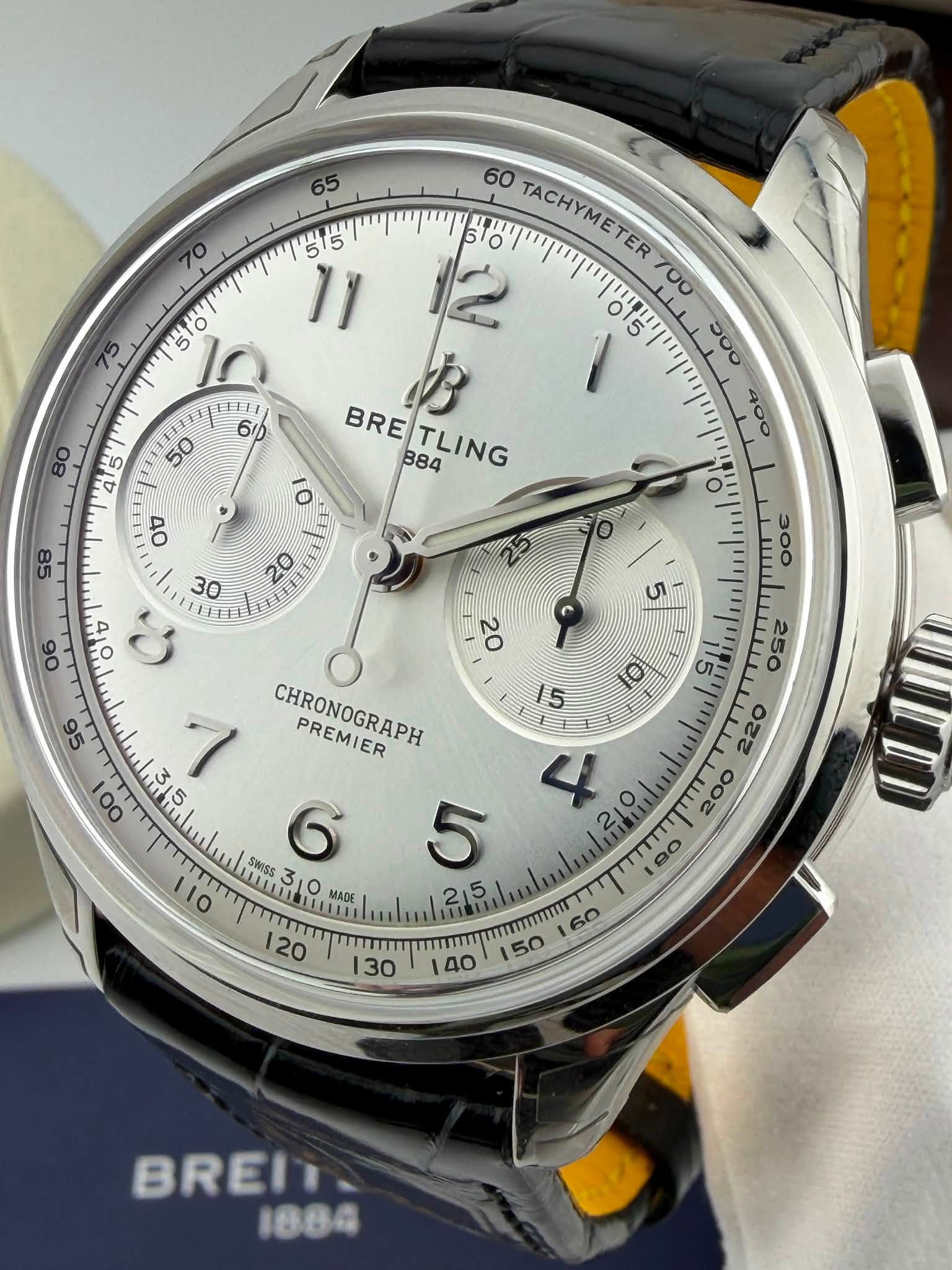 May be an image of wrist watch and text that says '65 70 75 Iy 60 TACHYMETER 12 TACHYMETER700 ER l' 日 50 BRETLING BRE 884 TLING 10 o0 ሚ و ህ 95 3 ١ CHRONOGRAPH PREMIER 00 SWISS 6…
