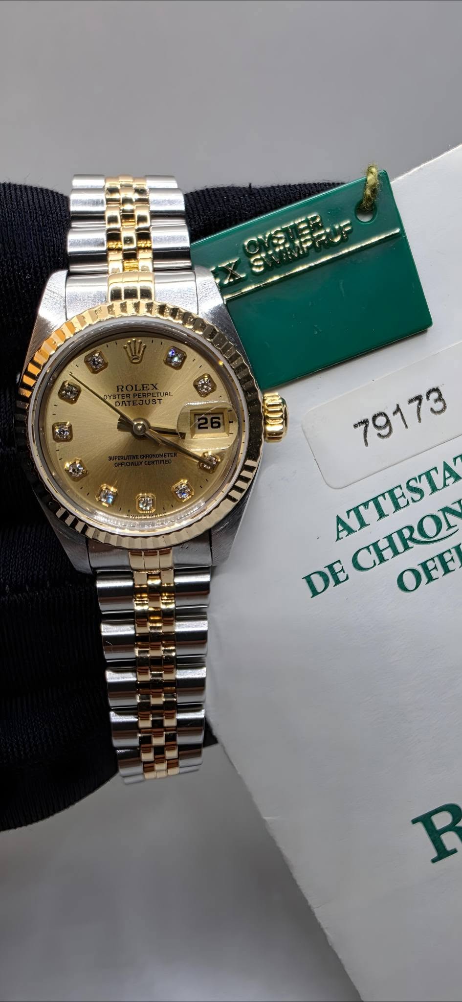 May be an image of wrist watch and text