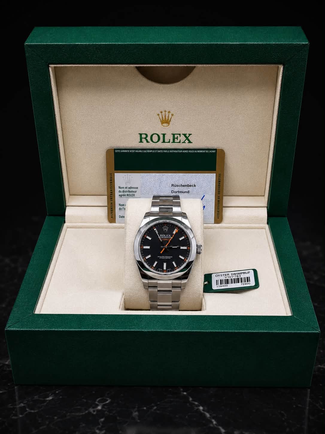 May be an image of wrist watch and text