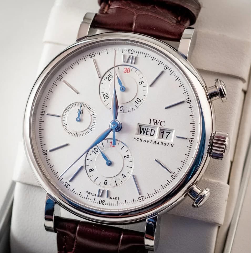 May be an image of wrist watch and text that says '50 30 60 יןייון יןייין 1511 ู 25 ى 20 10 5, 12 '1 IWC WED WED17 17 SCHAFFHAUSEN I ג20 SWISS οΣι MADE 25'