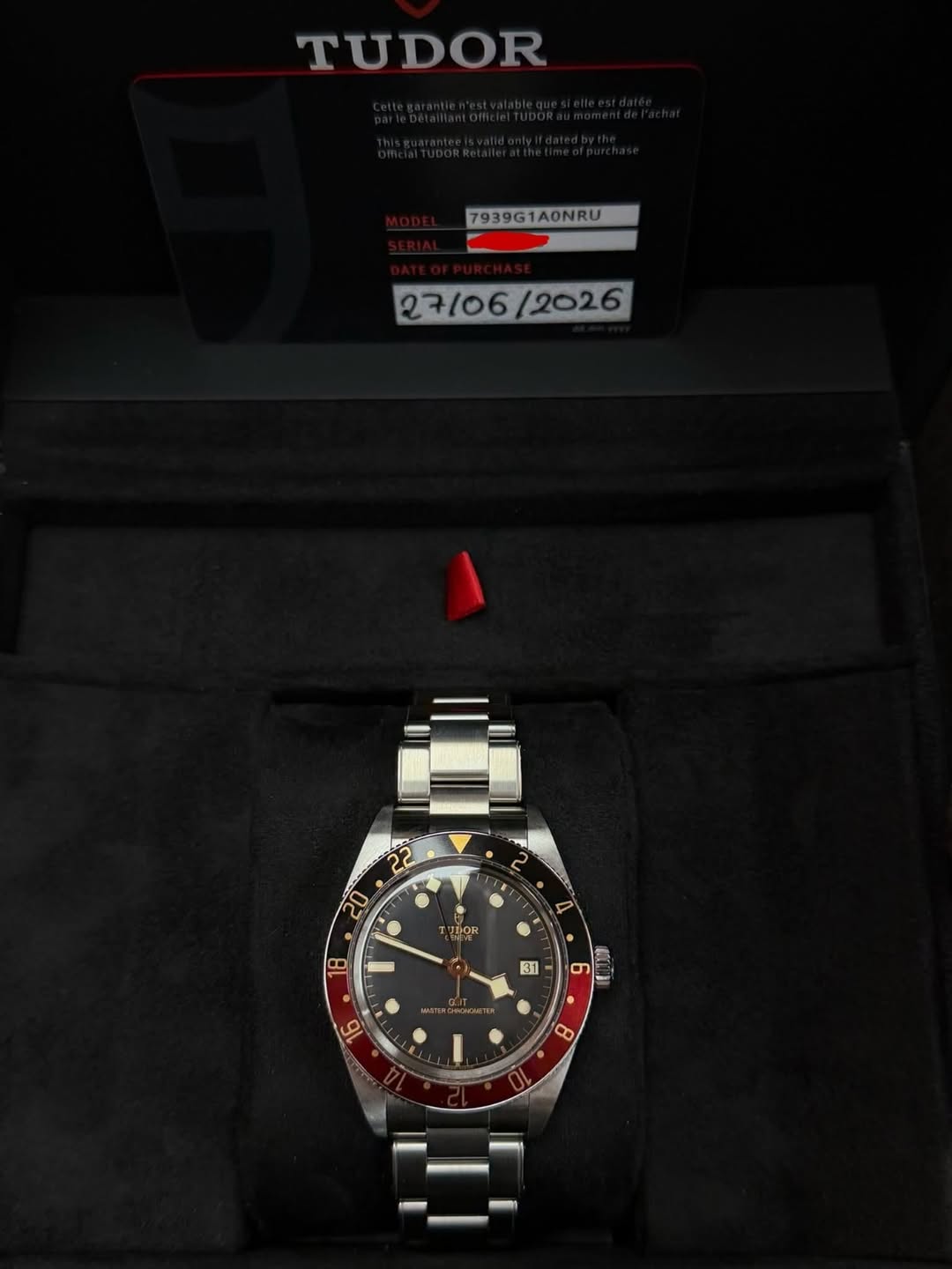 May be an image of wrist watch and text that says 'TUDOR 7939G1A0NRU 27/06 27/06/2026 / IIOR م 8'