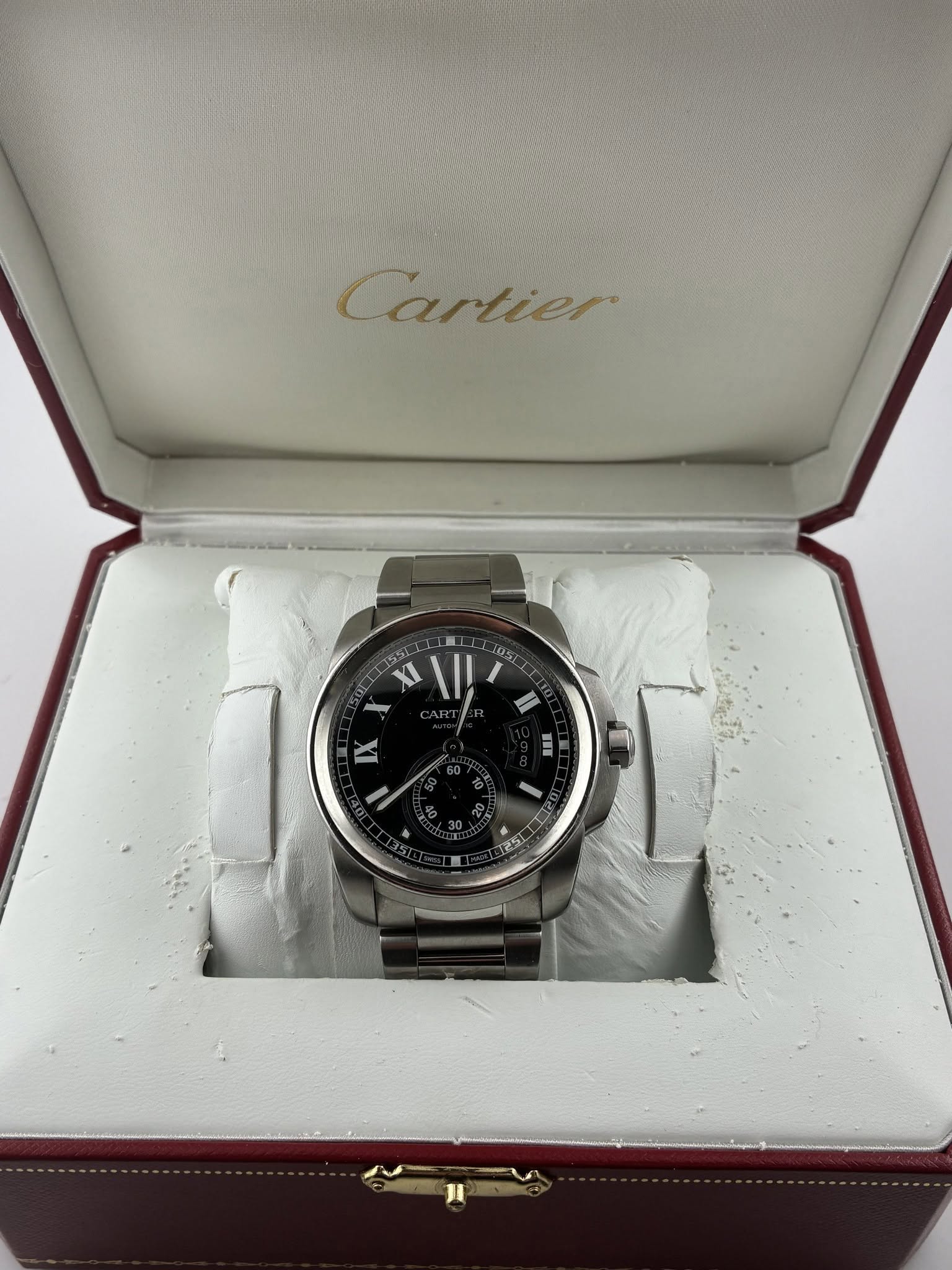 May be an image of wrist watch and text