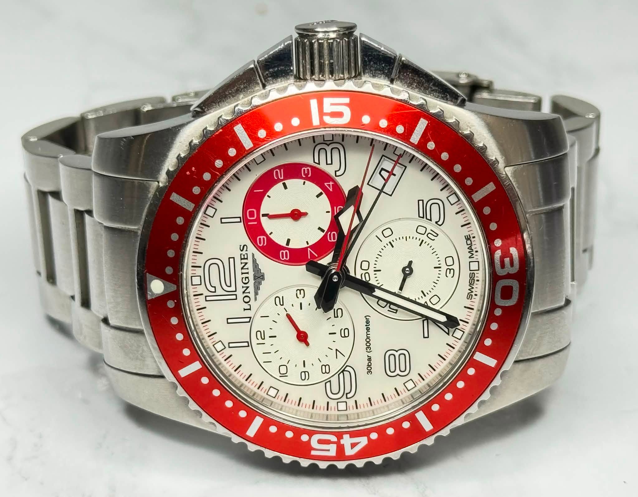 May be an image of wrist watch and text that says 'ณ 新海器 0 15 ወ ന 回 4 I0 ഗേ 22 لم MADE 30 ယ " 10 6 12 LONGINES လ က 2 09 لـ " O 5 ហ 9 (1ခ1စယခ 0 ၈ O මා 0 лAo 00 C つ'