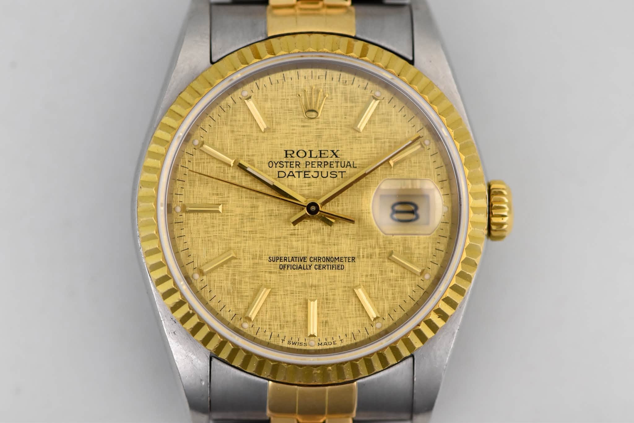 May be an image of wrist watch and text that says 'ROLEX OYSTER OYSTERPERPETUAL PERPETUAL DATEJUST 8 SUPERLATIVE.CHRONOMETER SUPERLATIVE CHRONOMETER OFFICIALLY…