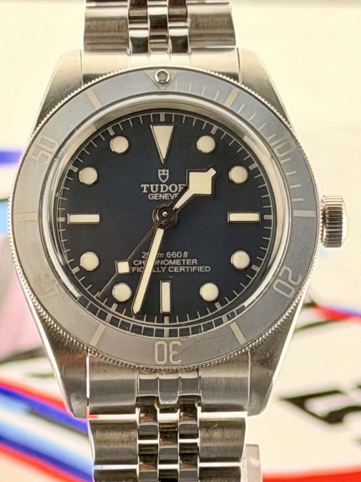 May be an image of wrist watch and text