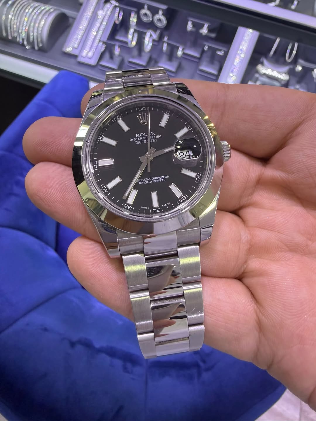 May be an image of wrist watch and text