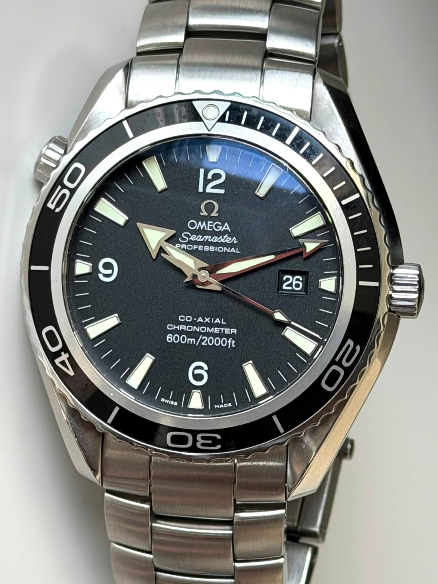 May be an image of wrist watch and text that says 'II0 50 5 12 חל OMEGA Seamaster PROFE PROFESSIONAL I 26 و O 40 Lil CO-AXIAL co CHRONOMETER 600m 600m/2000ft /2000ft 4 6 SWISS…