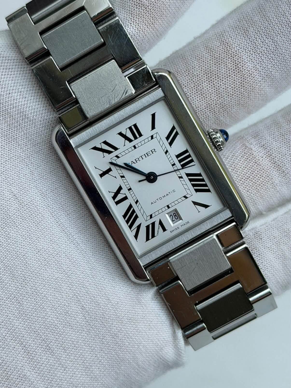 May be an image of digital watch, strap, timer and text