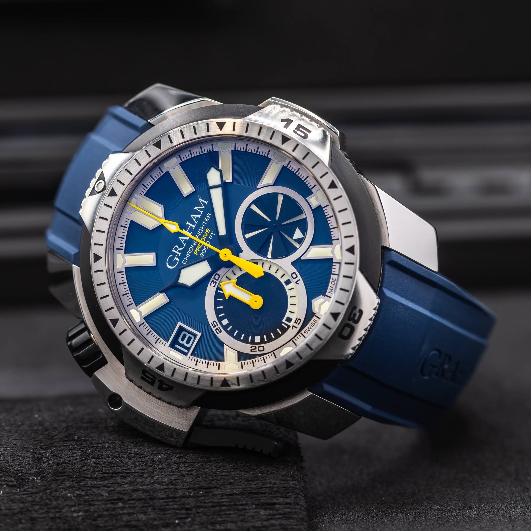 May be an image of wrist watch, strap and text