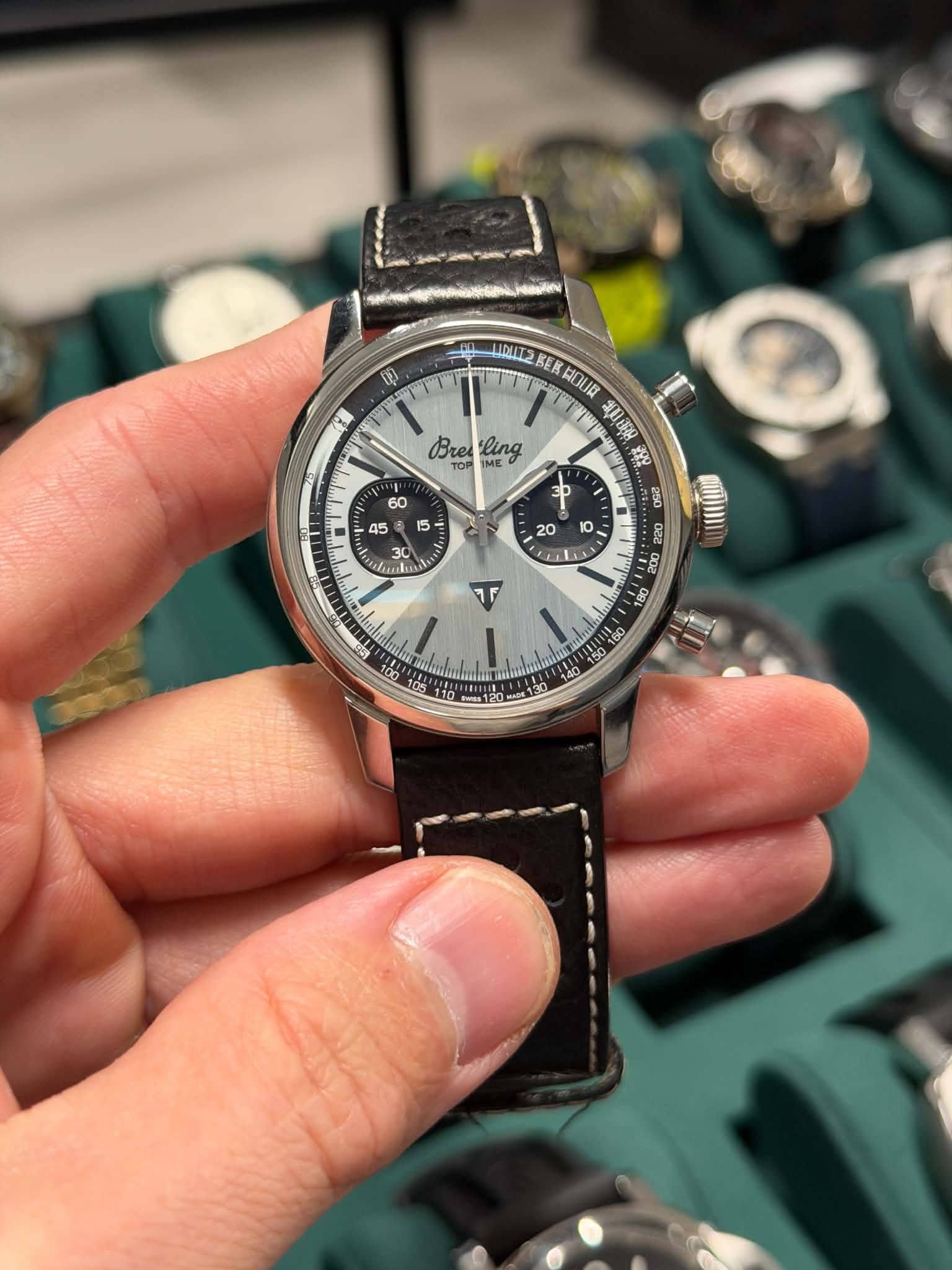 May be an image of wrist watch and text