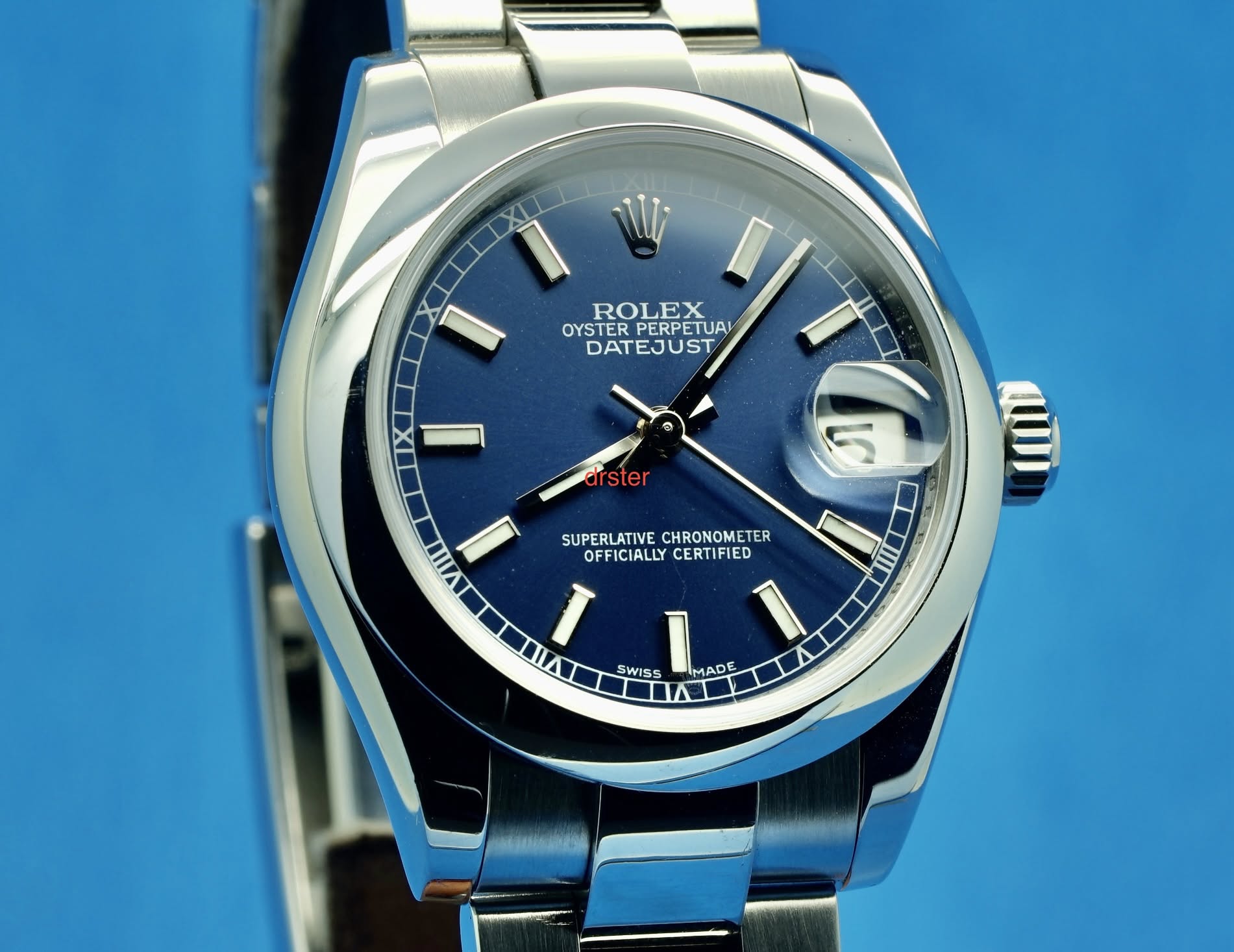 May be an image of wrist watch and text that says 'W ROLEX OYSTER OYSTERPERPETUA PERPETUAL DATEJUST IX drster 5 Απ SUPERLATIVE SUPERLATIVECHRONOMETER CHRONOMETER OFFICIALLY…